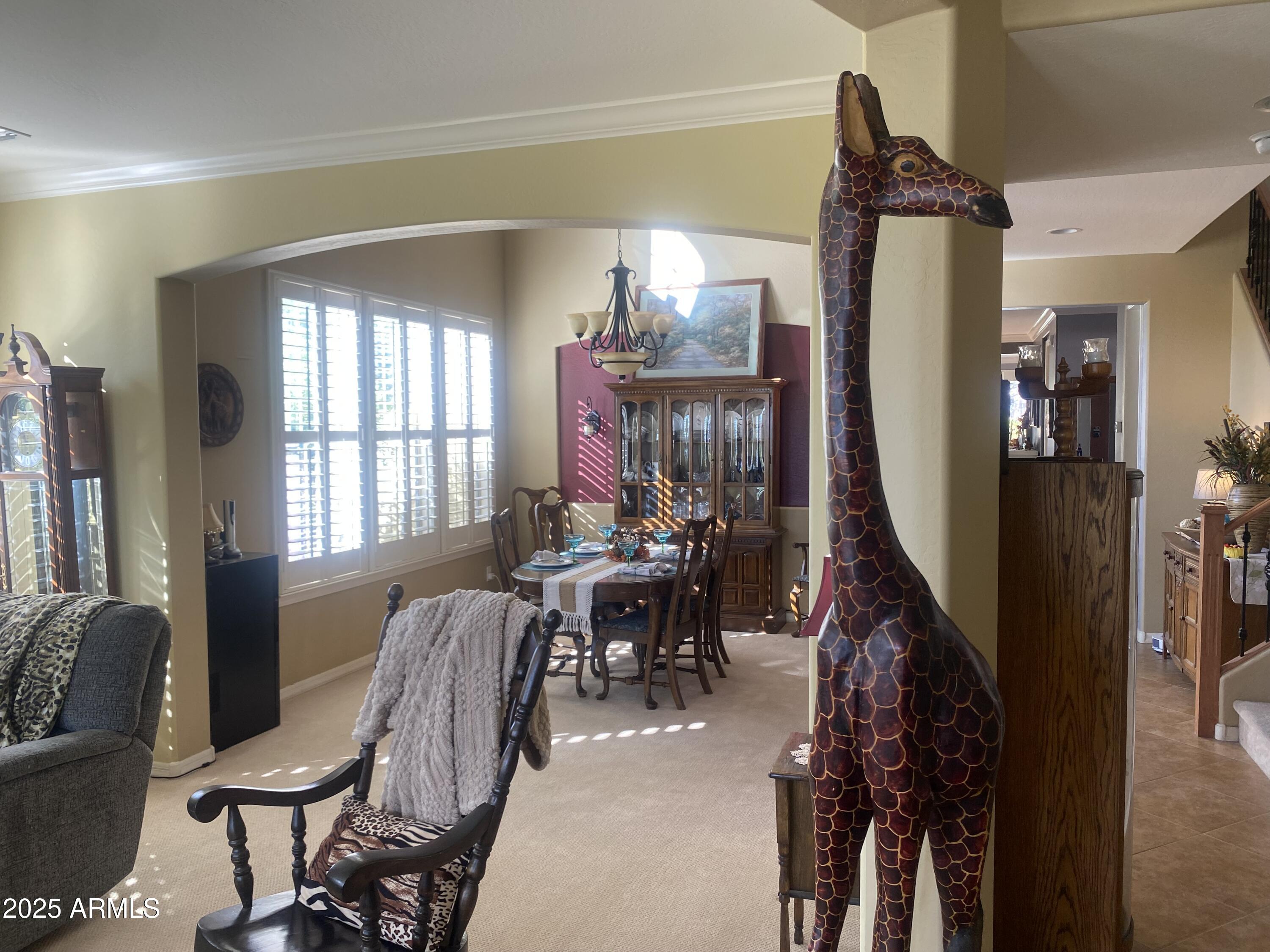 2946 North Beverly Place Buckeye, AZ 85396 - Photo 24 of 61 DINING ROOM WITH TWIGA THE GIRAFFE