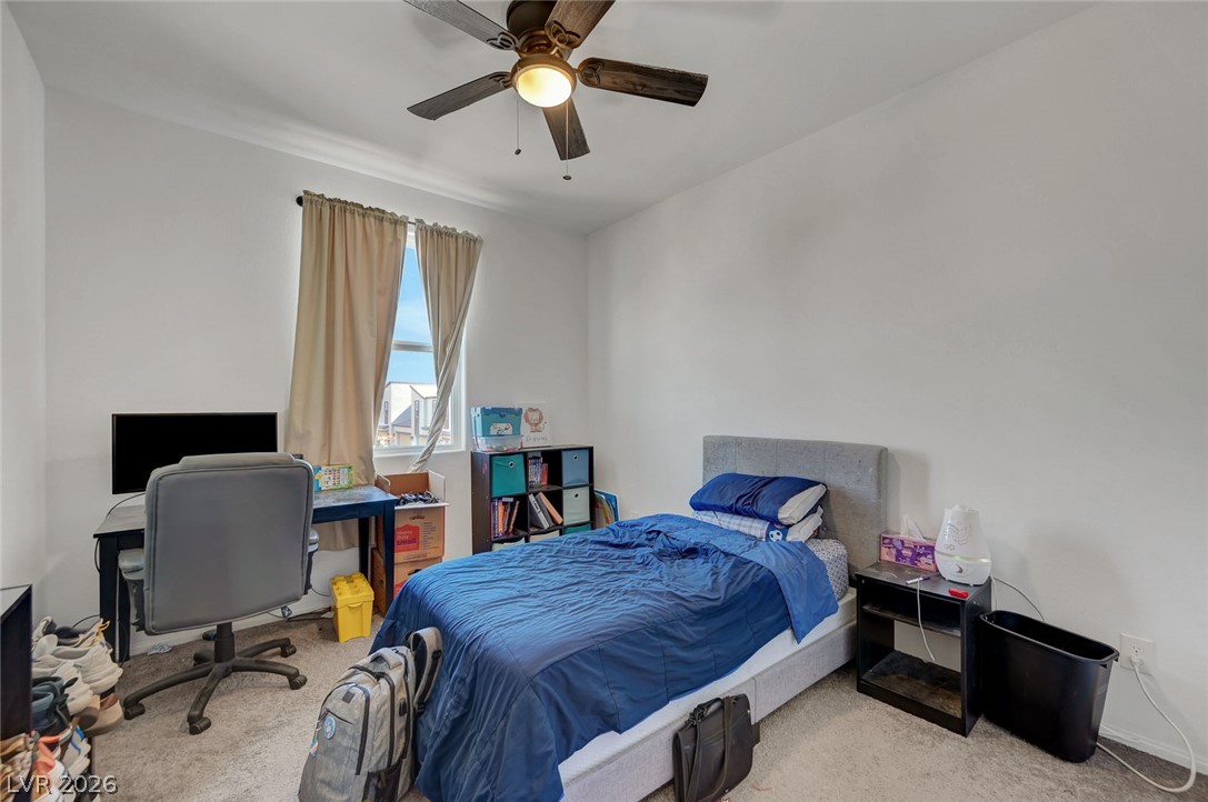 1285 Raritan Place Henderson, NV 89002 - Photo 9 of 20 Plentiful natural light filters through the window of this cozy carpeted bedroom.