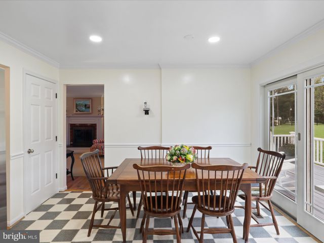 a living room with furniture fireplace and a flat screen tv