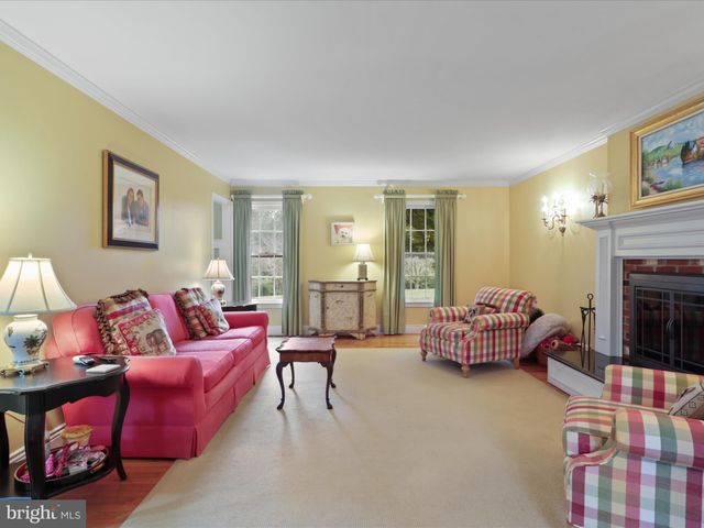 a bedroom with a bed and a table