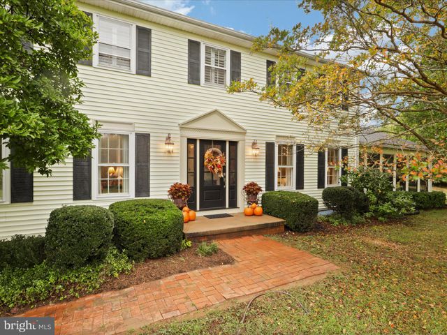 a kitchen with stainless steel appliances a refrigerator stove and microwave