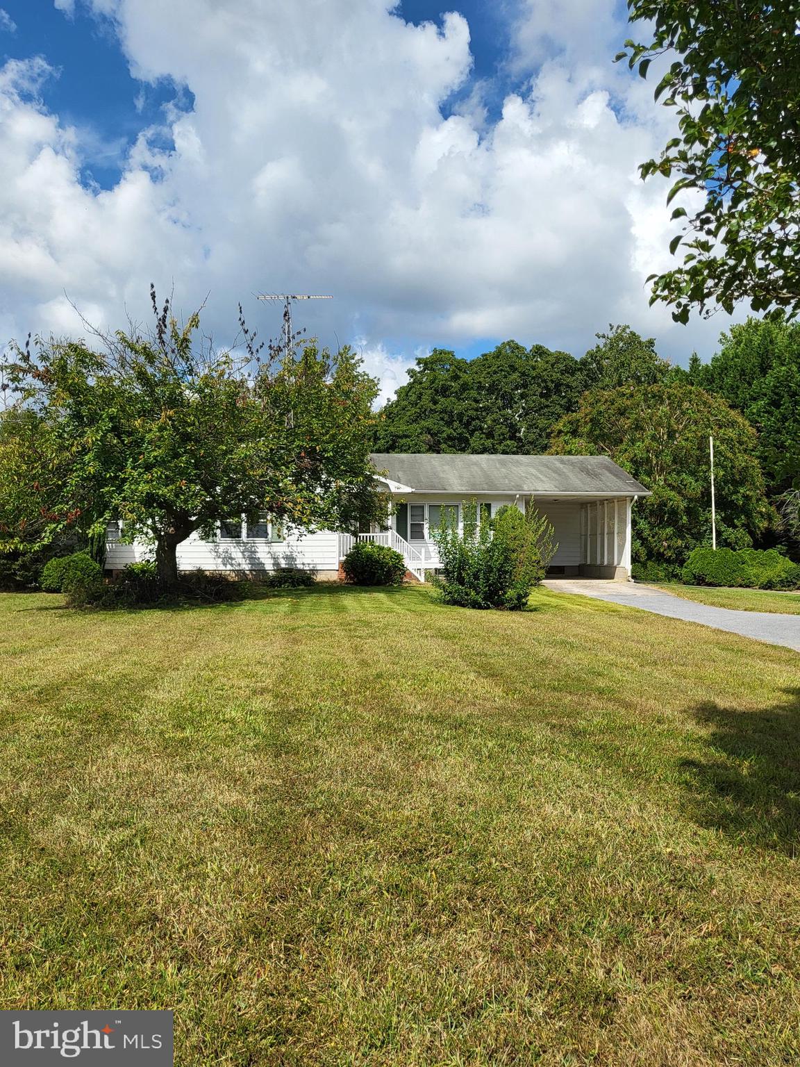 2189 Judith Road Hartly, DE 19953 - Photo 1 of 26 a front view of house with yard and lake
