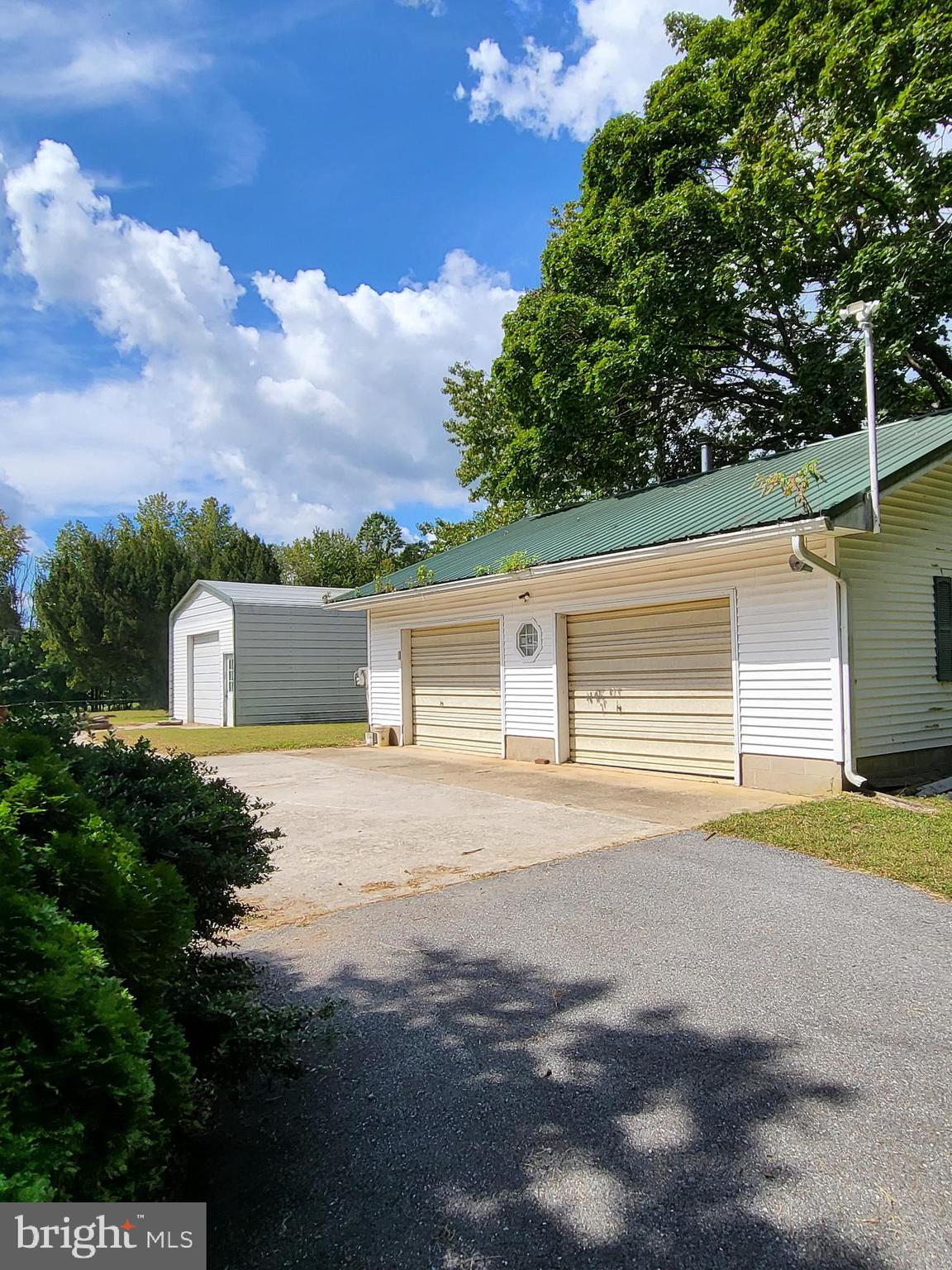 2189 Judith Road Hartly, DE 19953 - Photo 2 of 26 a view of a house with a yard and garage