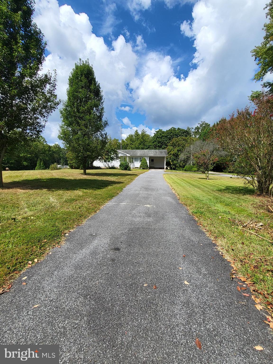 2189 Judith Road Hartly, DE 19953 - Photo 25 of 26 a view of a yard with an outdoor space and seating area