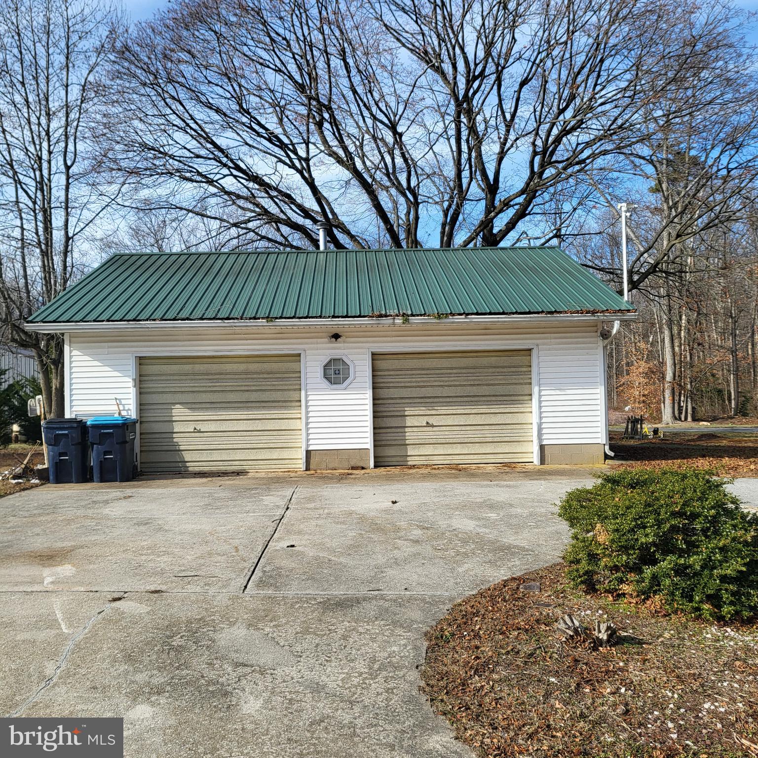 2189 Judith Road Hartly, DE 19953 - Photo 3 of 26 a view of a house with a yard and garage