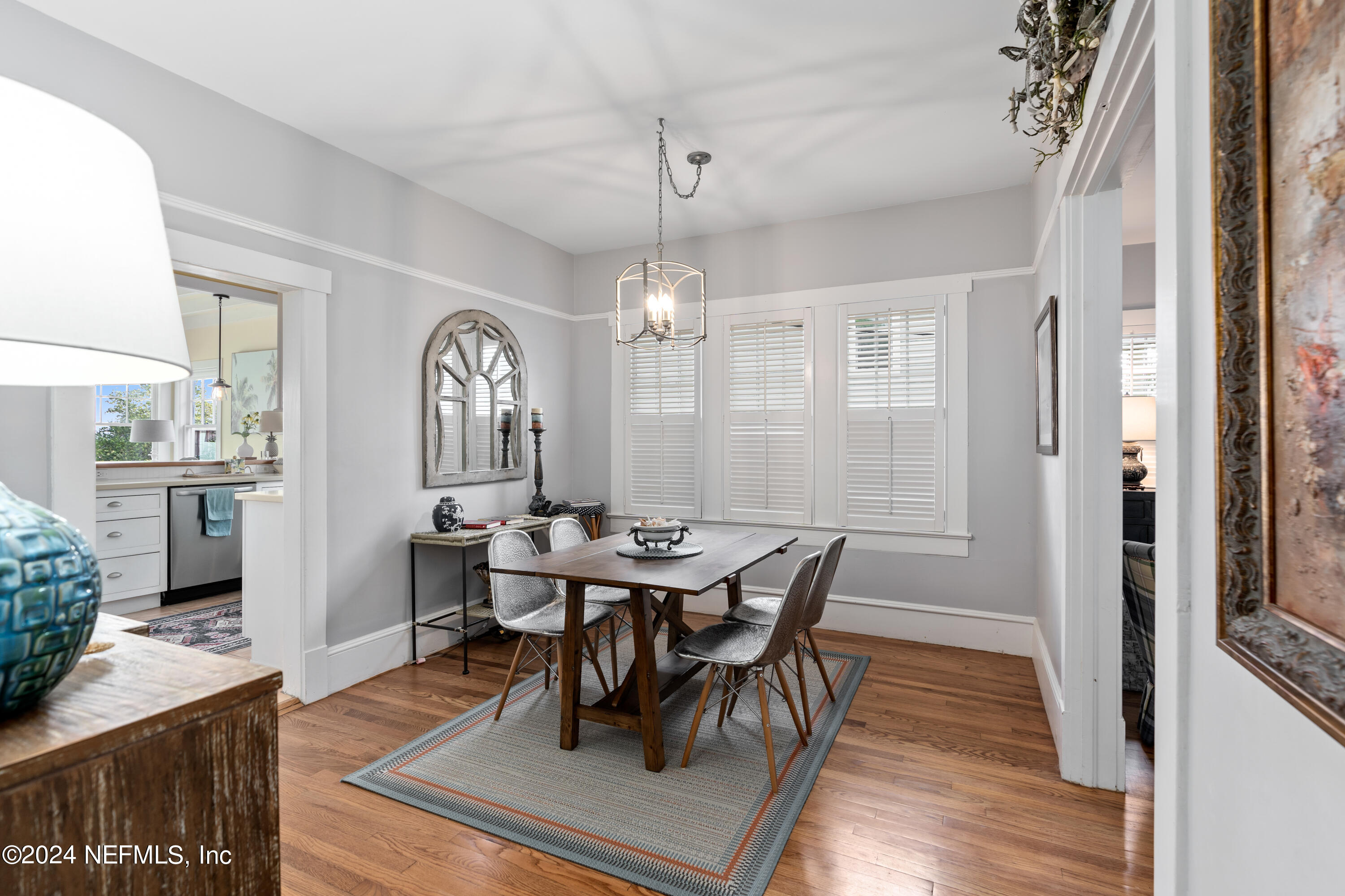 34 Park Avenue St. Augustine, FL 32084 - Photo 11 of 37 a view of a dining room with furniture window and wooden floor