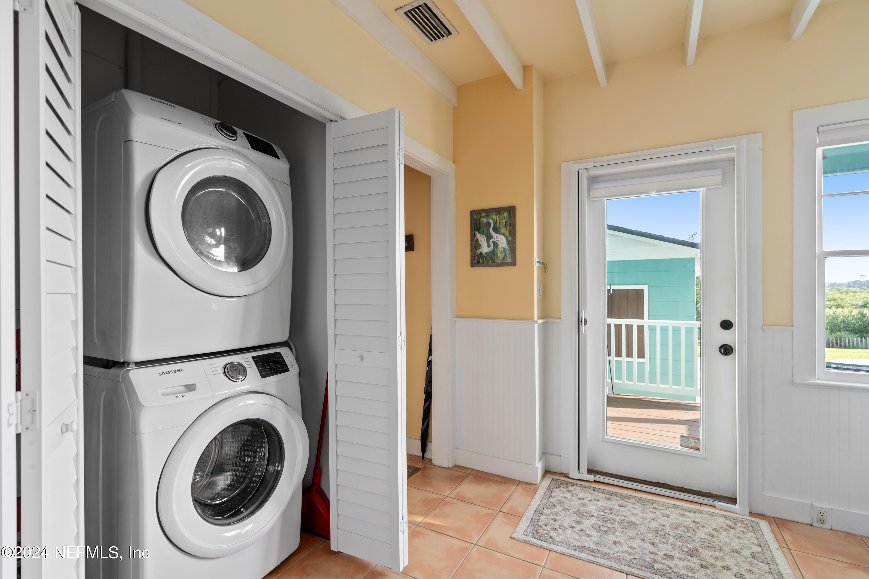 34 Park Avenue St. Augustine, FL 32084 - Photo 18 of 37 a utility room with sink dryer and washer