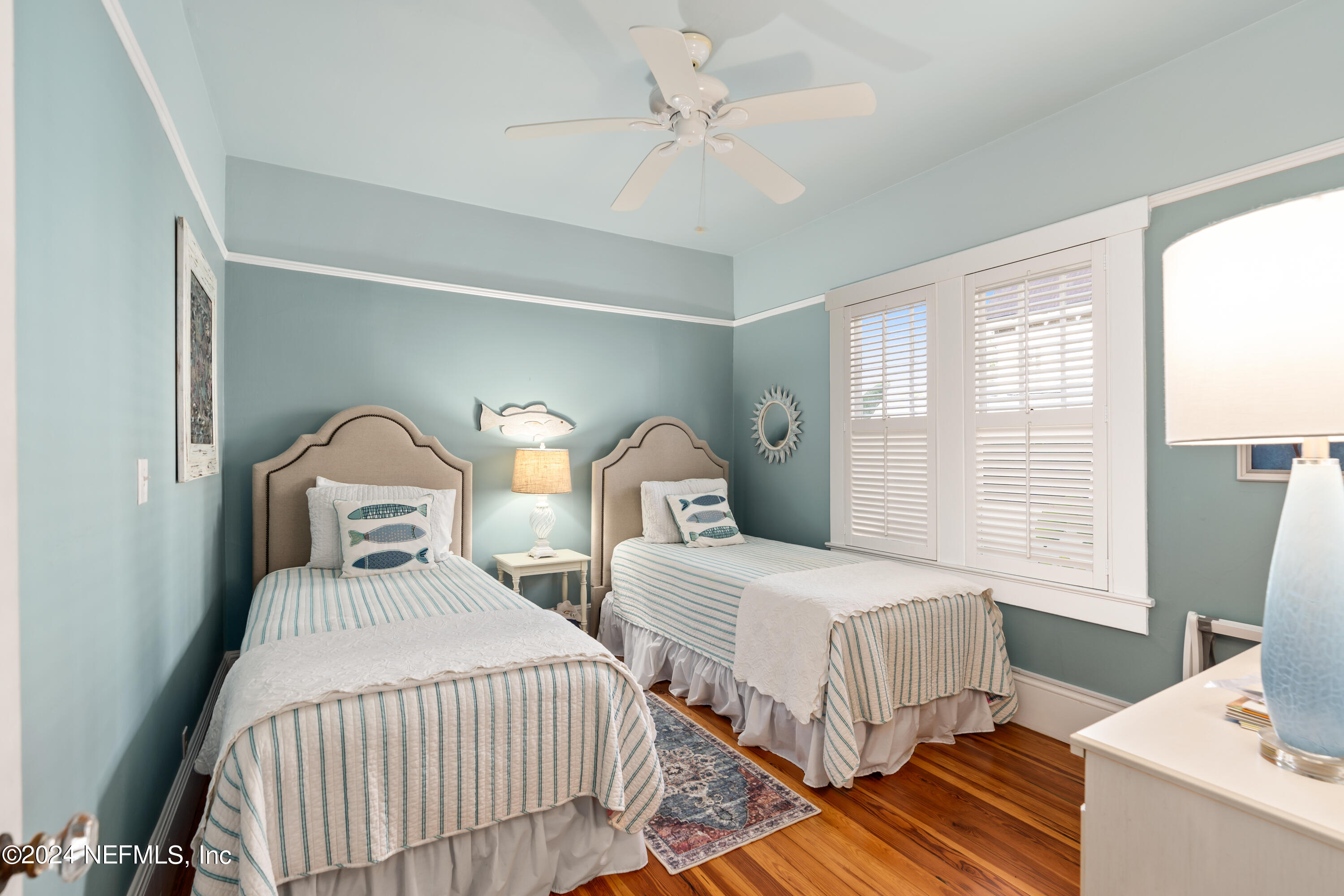 34 Park Avenue St. Augustine, FL 32084 - Photo 19 of 37 a bedroom with two beds and a table