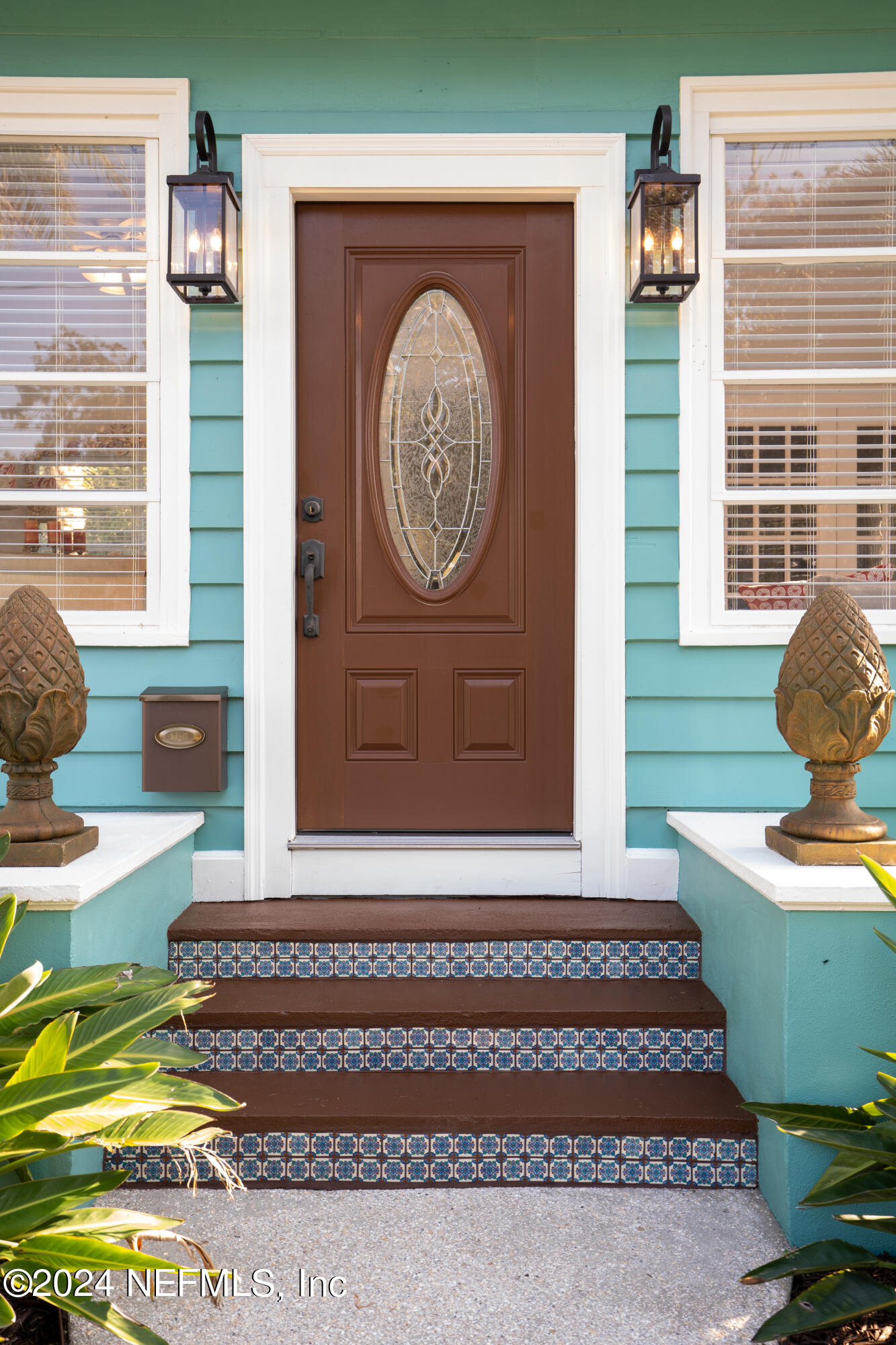 34 Park Avenue St. Augustine, FL 32084 - Photo 5 of 37 a front view of a house with garden and entryway