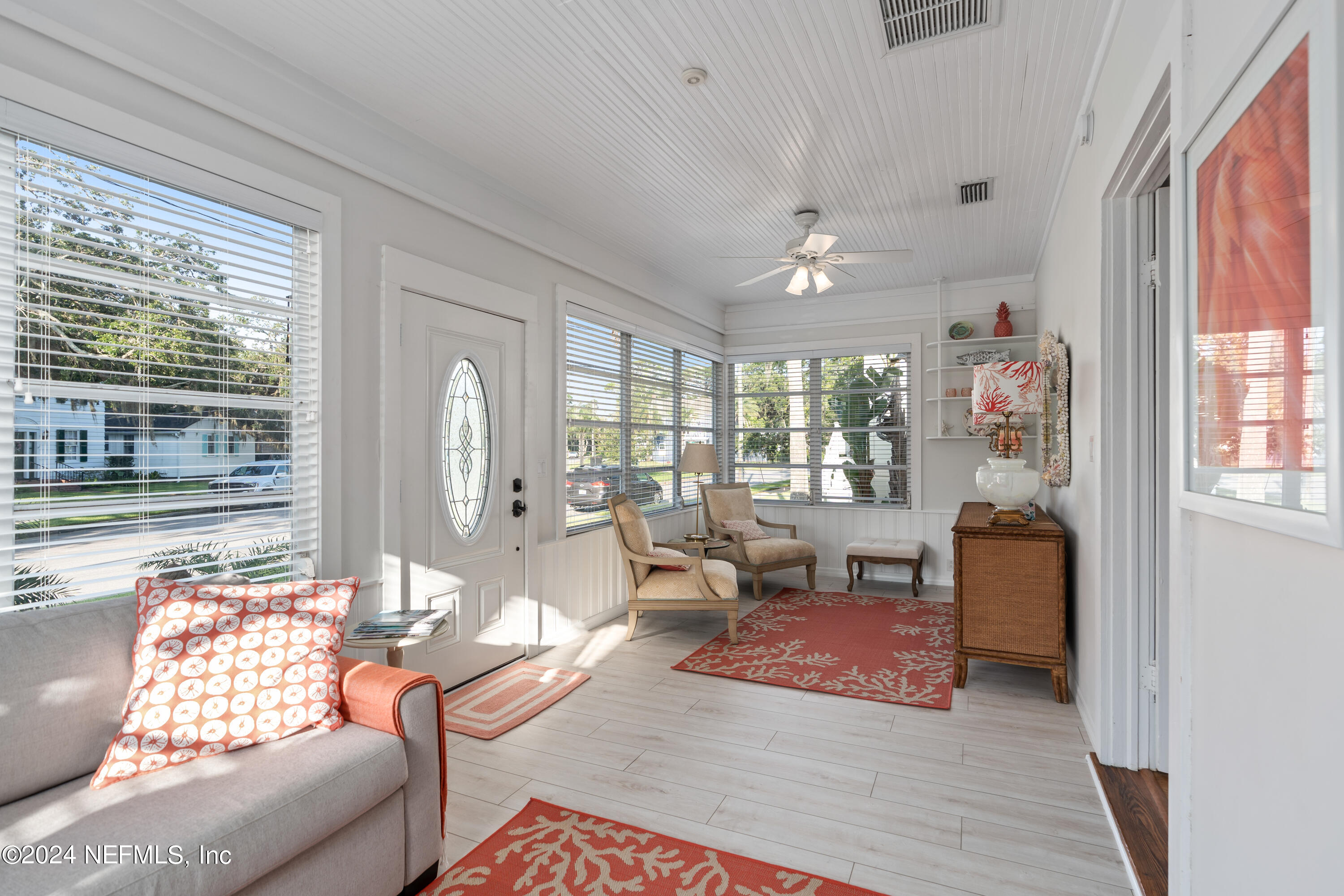 34 Park Avenue St. Augustine, FL 32084 - Photo 7 of 37 a living room with furniture and a large window