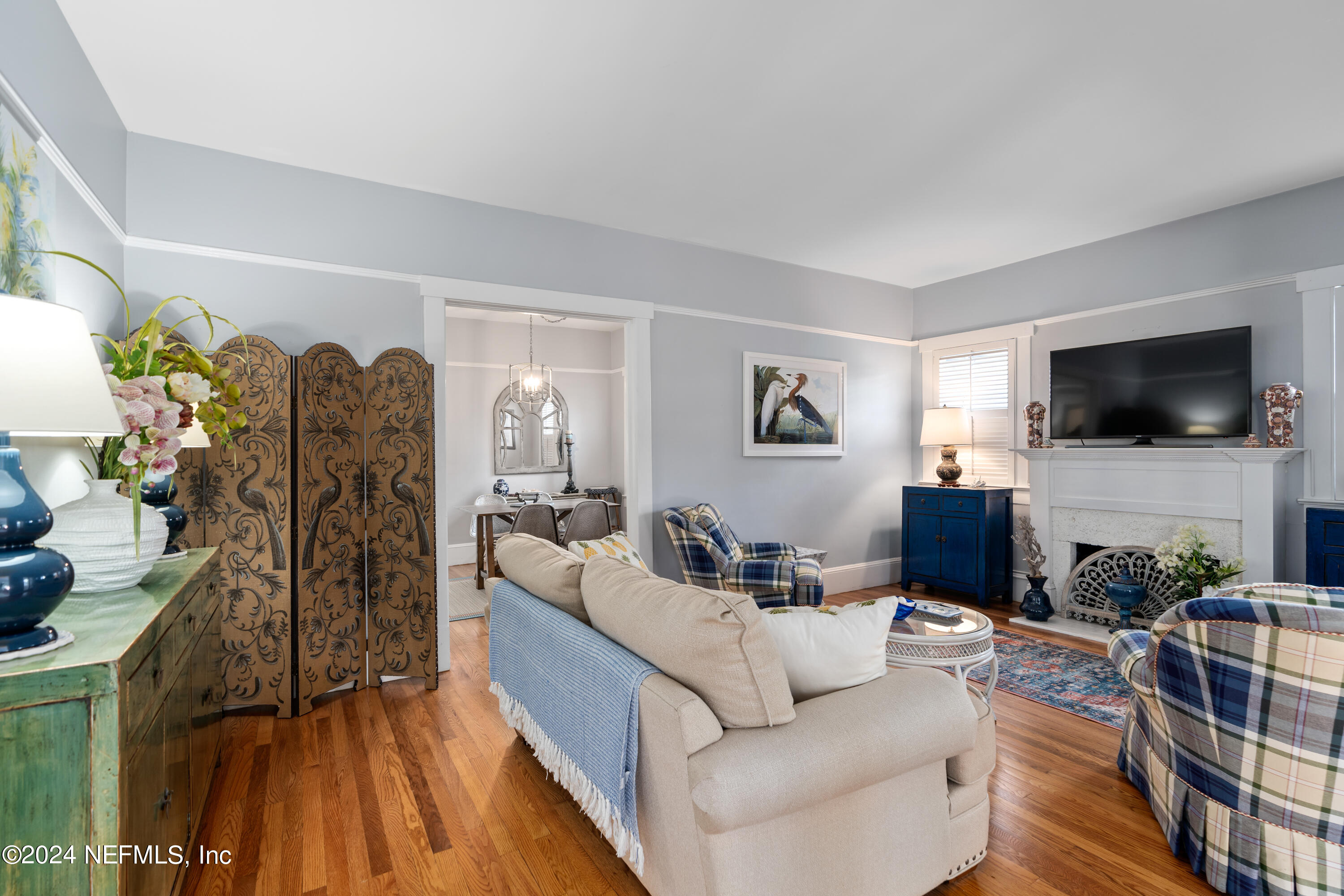 34 Park Avenue St. Augustine, FL 32084 - Photo 8 of 37 a living room with furniture and a flat screen tv