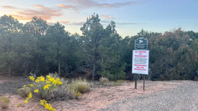a view of a street with a sign broad