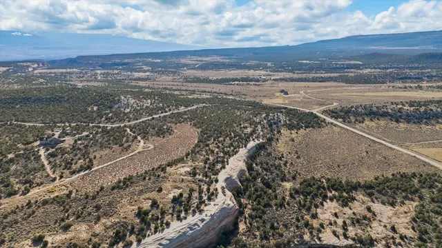 a view of an ocean and a mountain