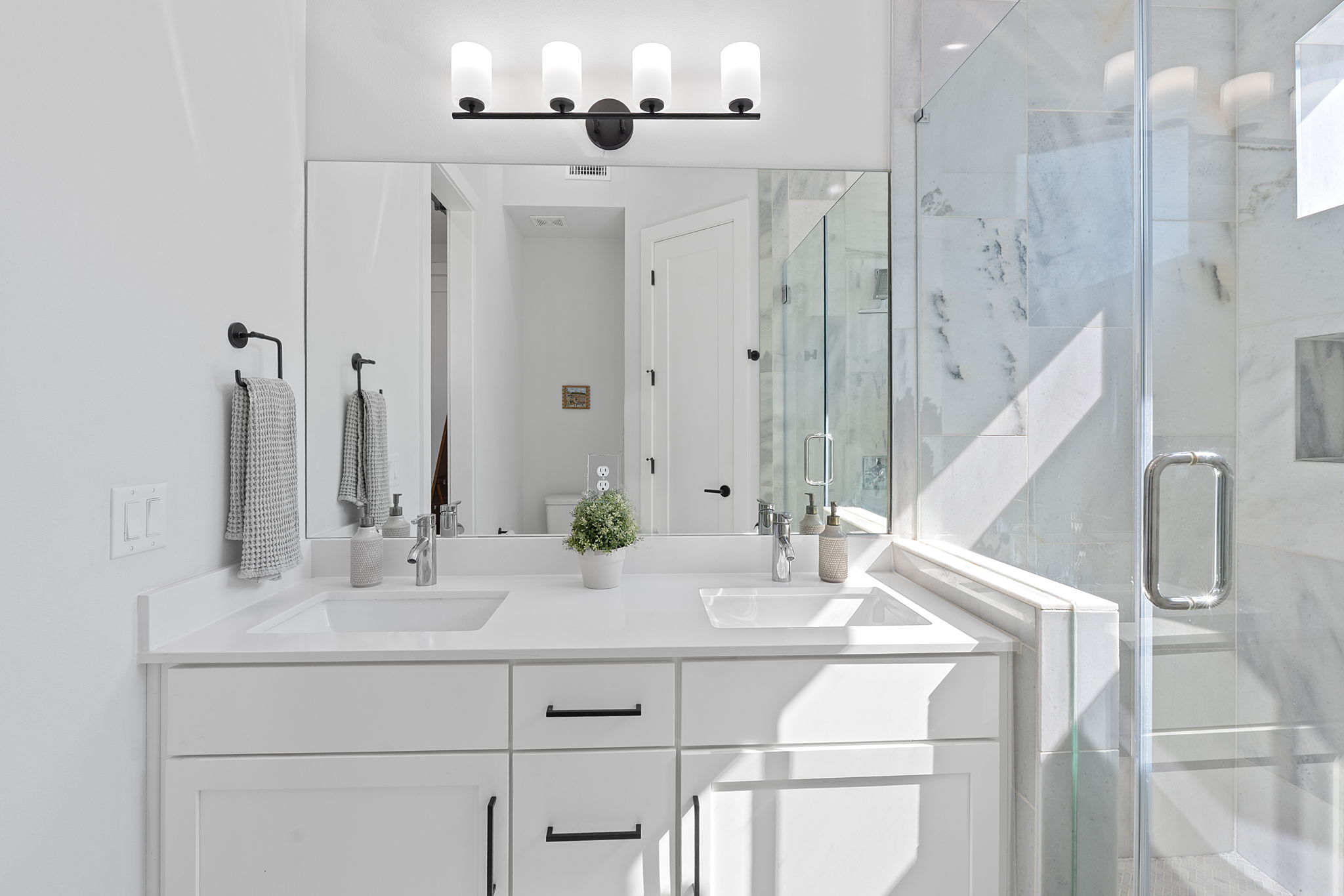 1168 Ridgeway Drive, Unit 2 Austin, TX 78702 - Photo 14 of 25 a bathroom with a sink and a mirror