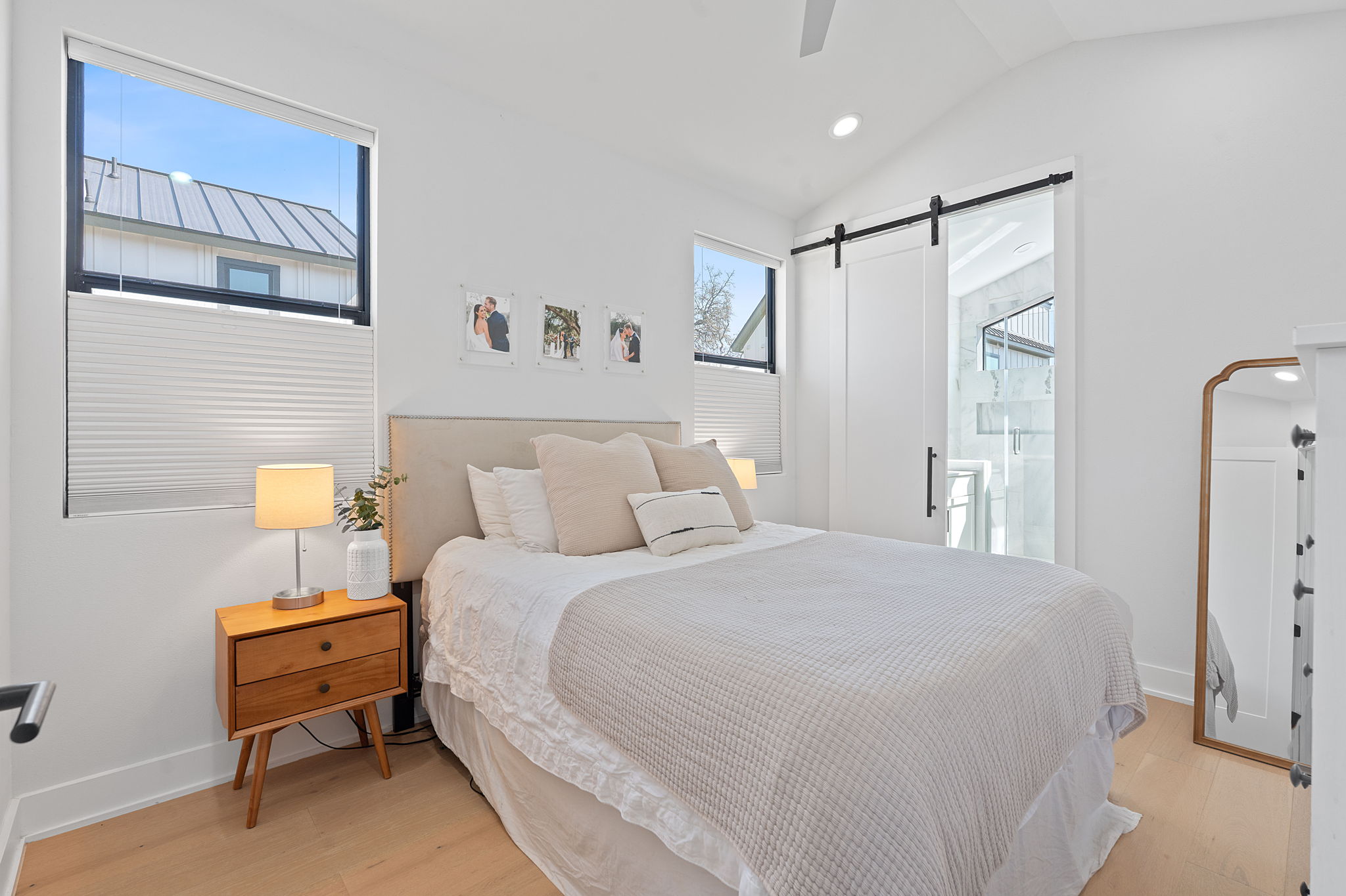 1168 Ridgeway Drive, Unit 2 Austin, TX 78702 - Photo 10 of 25 a bedroom with a bed and a walk in closet