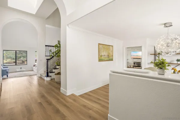 wooden floor in a livingroom with a window