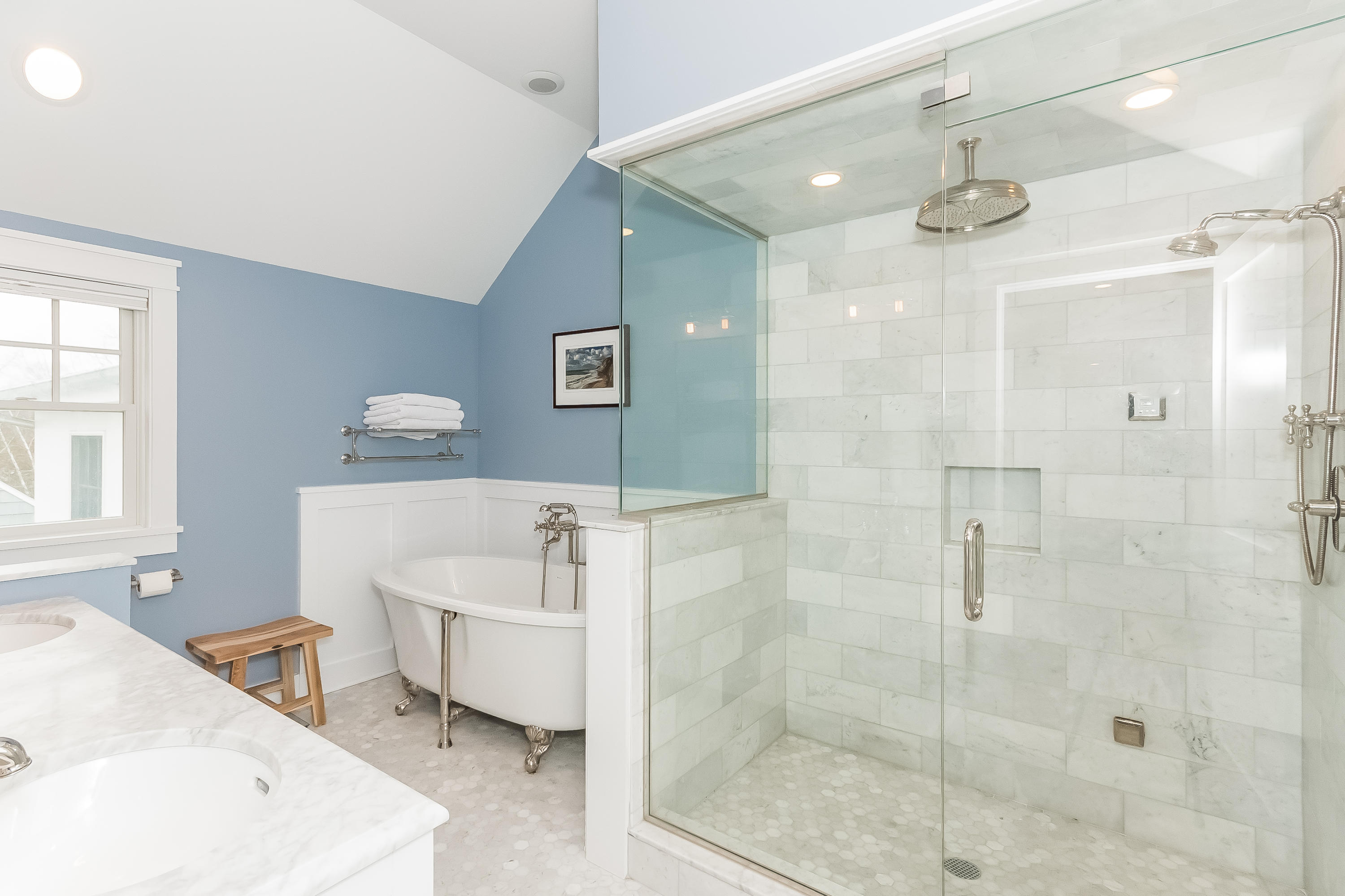 20 Plymouth Road Darien, CT 06820 - Photo 22 of 46 a bathroom with a tub a sink and a shower