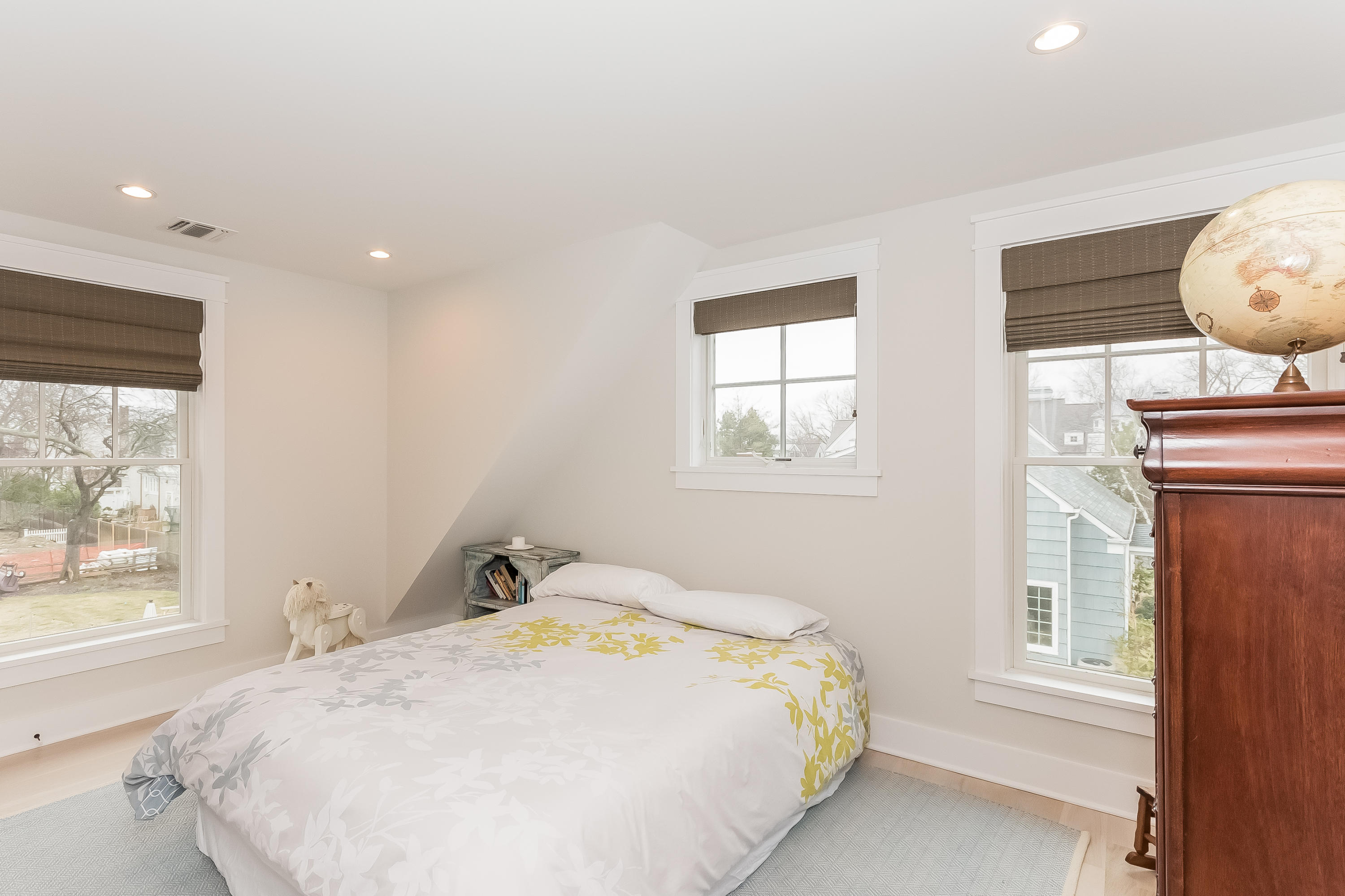 20 Plymouth Road Darien, CT 06820 - Photo 23 of 46 a bedroom with a bed and wooden floor