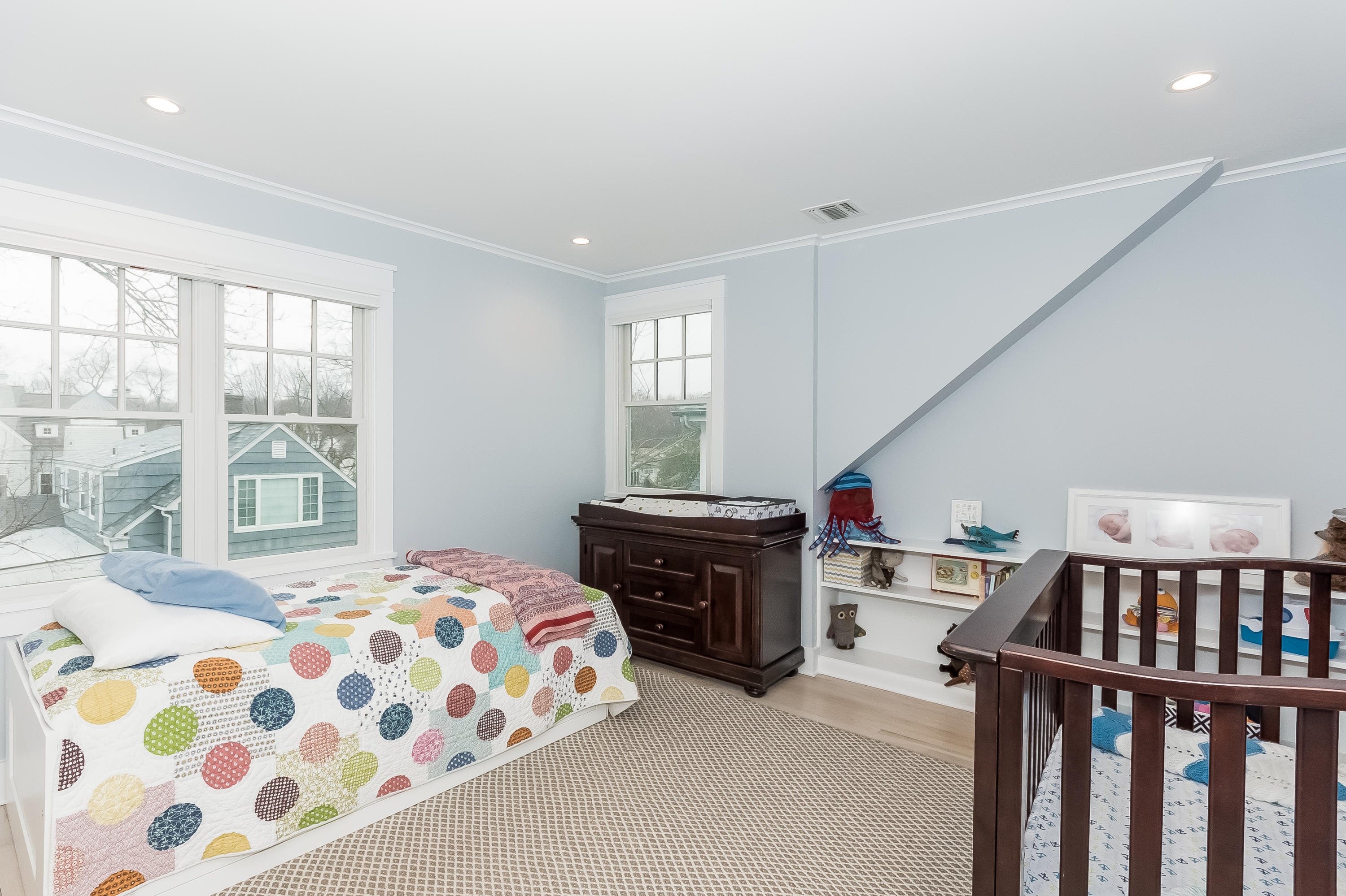 20 Plymouth Road Darien, CT 06820 - Photo 27 of 46 a bedroom with furniture and windows