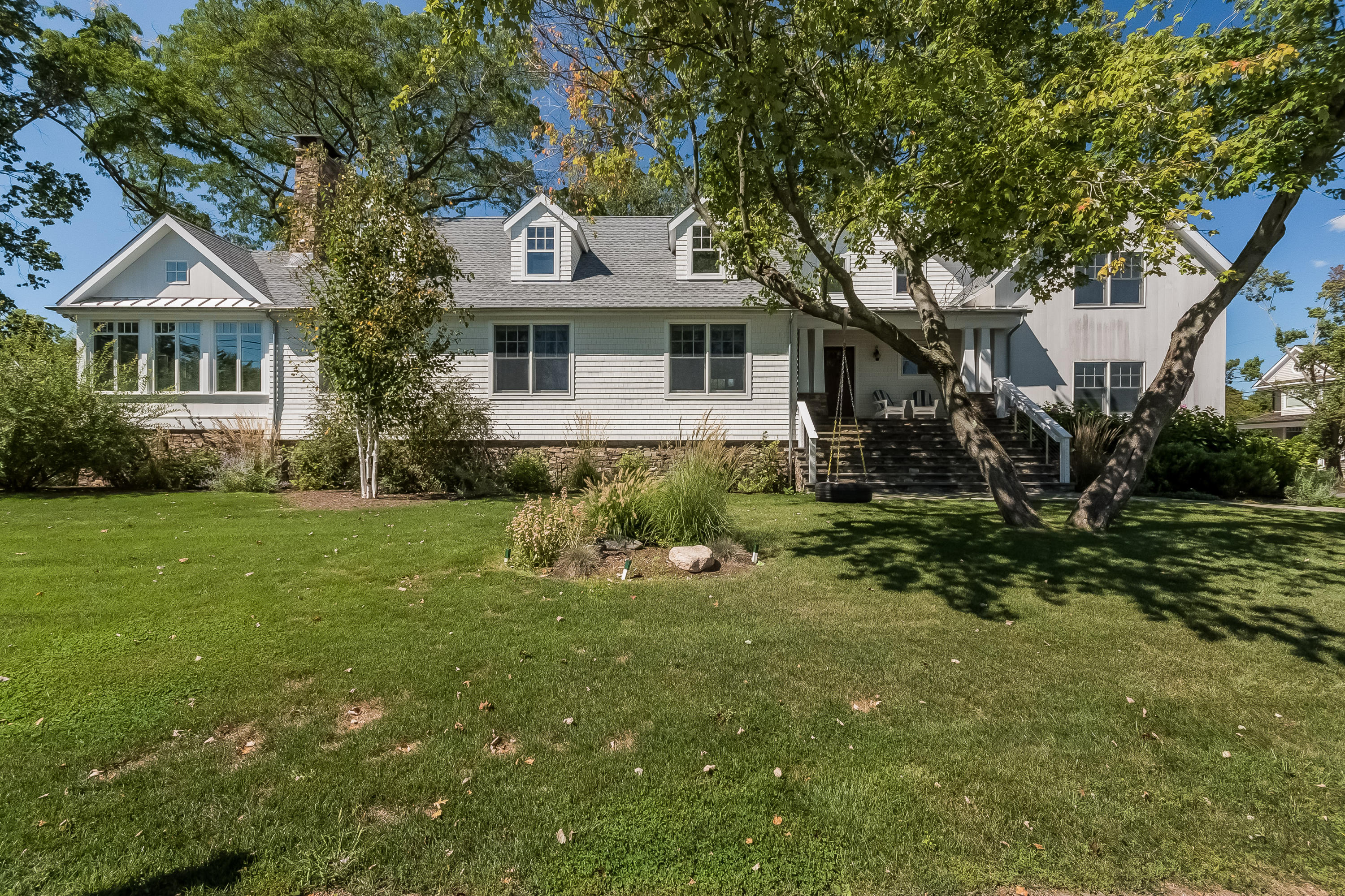 20 Plymouth Road Darien, CT 06820 - Photo 35 of 46 a front view of a house with a yard