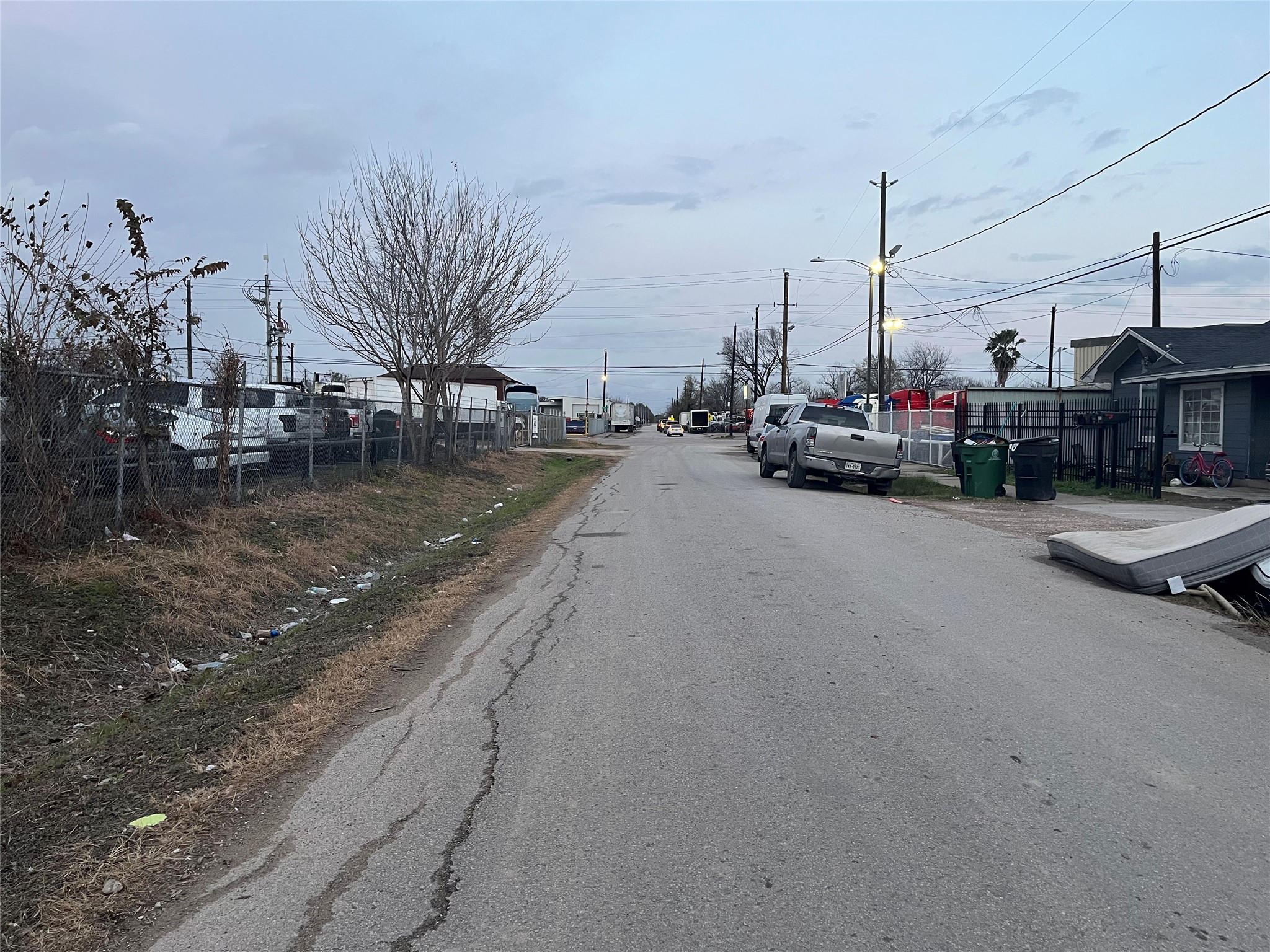 8016 Munn Street Houston, TX 77029 - Photo 12 of 24 a view of a street with cars