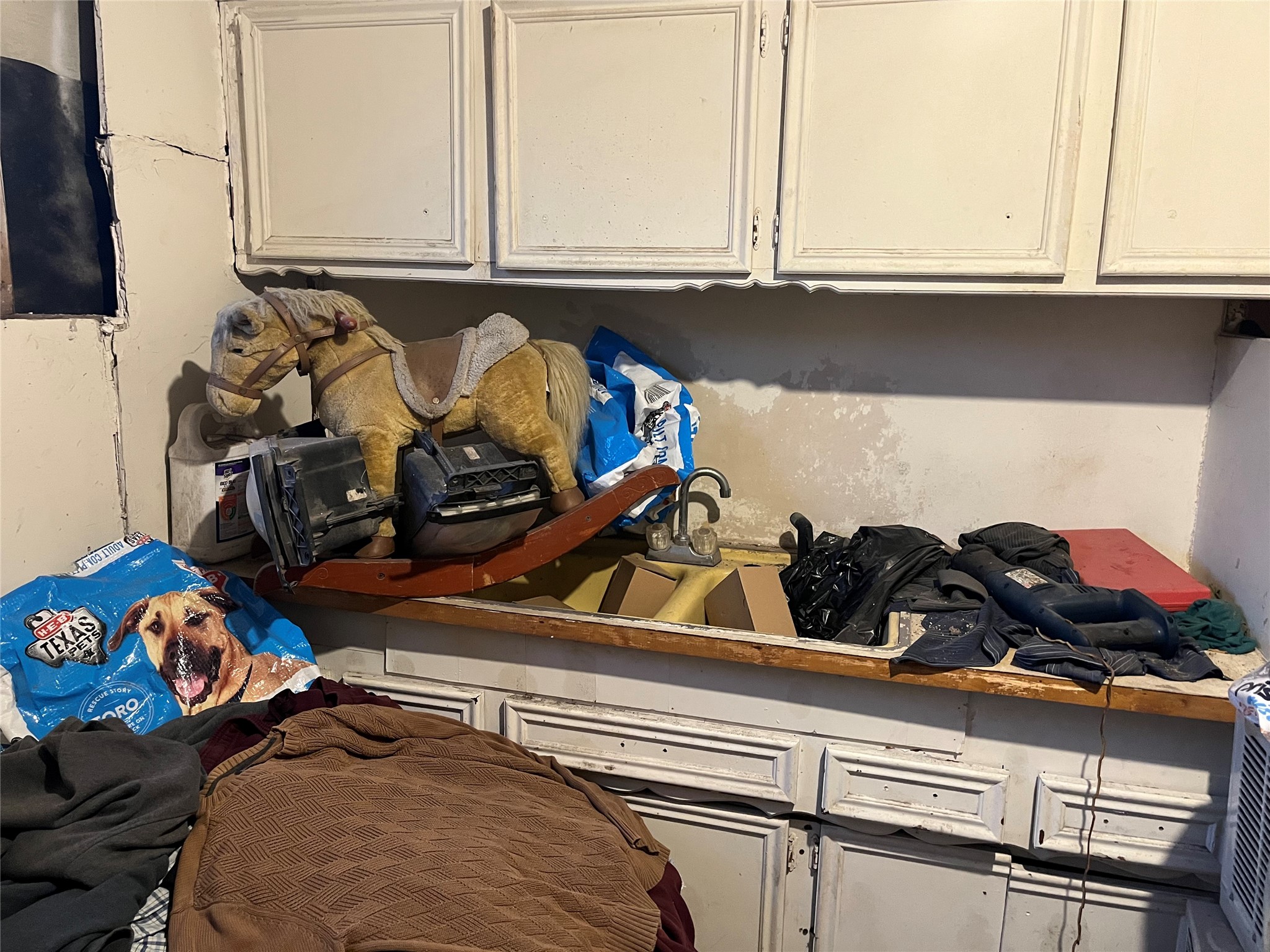 8016 Munn Street Houston, TX 77029 - Photo 13 of 24 a view of a closet with storage
