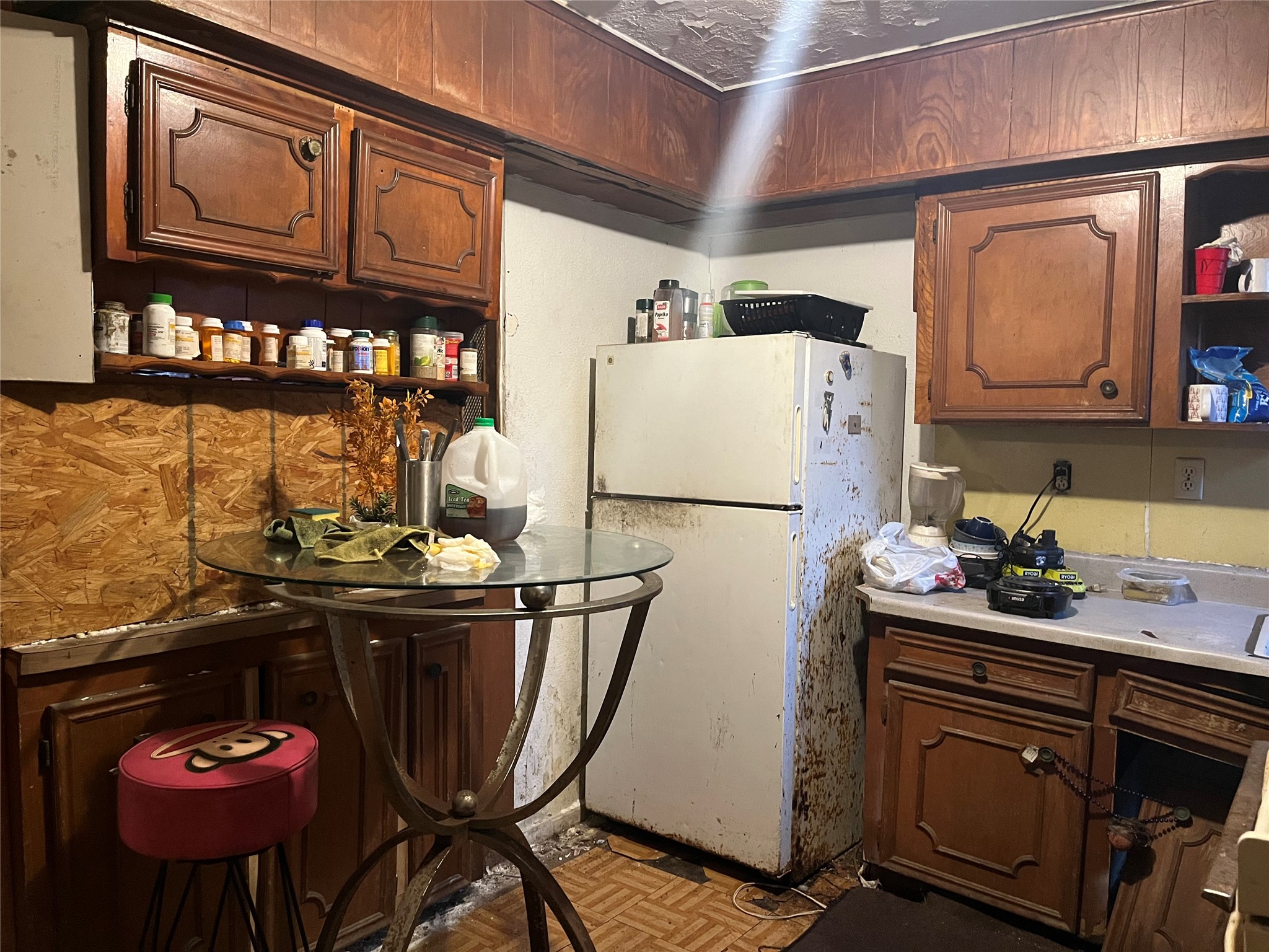 8016 Munn Street Houston, TX 77029 - Photo 17 of 24 a kitchen with stainless steel appliances granite countertop a sink refrigerator and cabinets