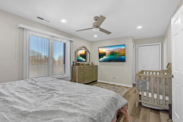 a bedroom with a bed and furniture