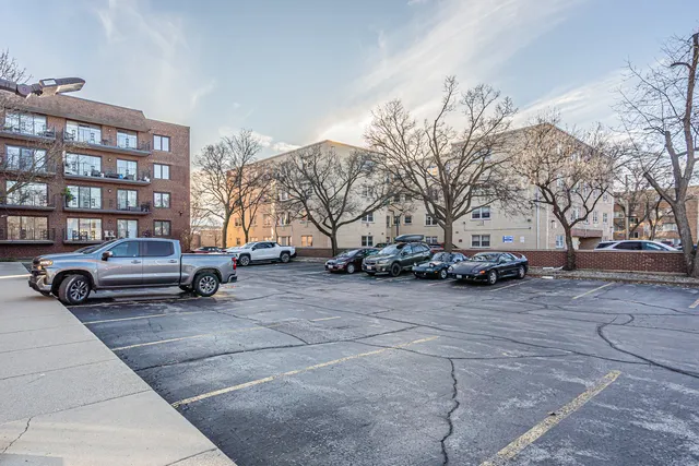 a view of street with parked cars
