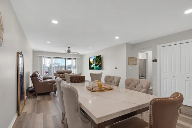 a view of a dining room with furniture window and outside view