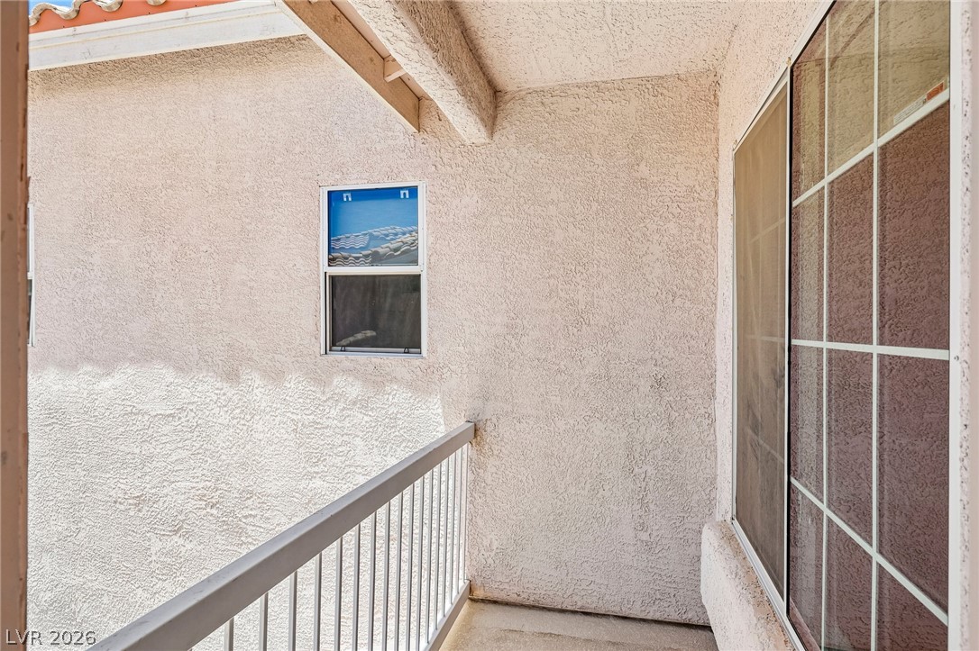 1176 Butternut Ranch Court Henderson, NV 89052 - Photo 43 of 60 A private balcony retreat, ideal for quiet mornings or evening contemplation.