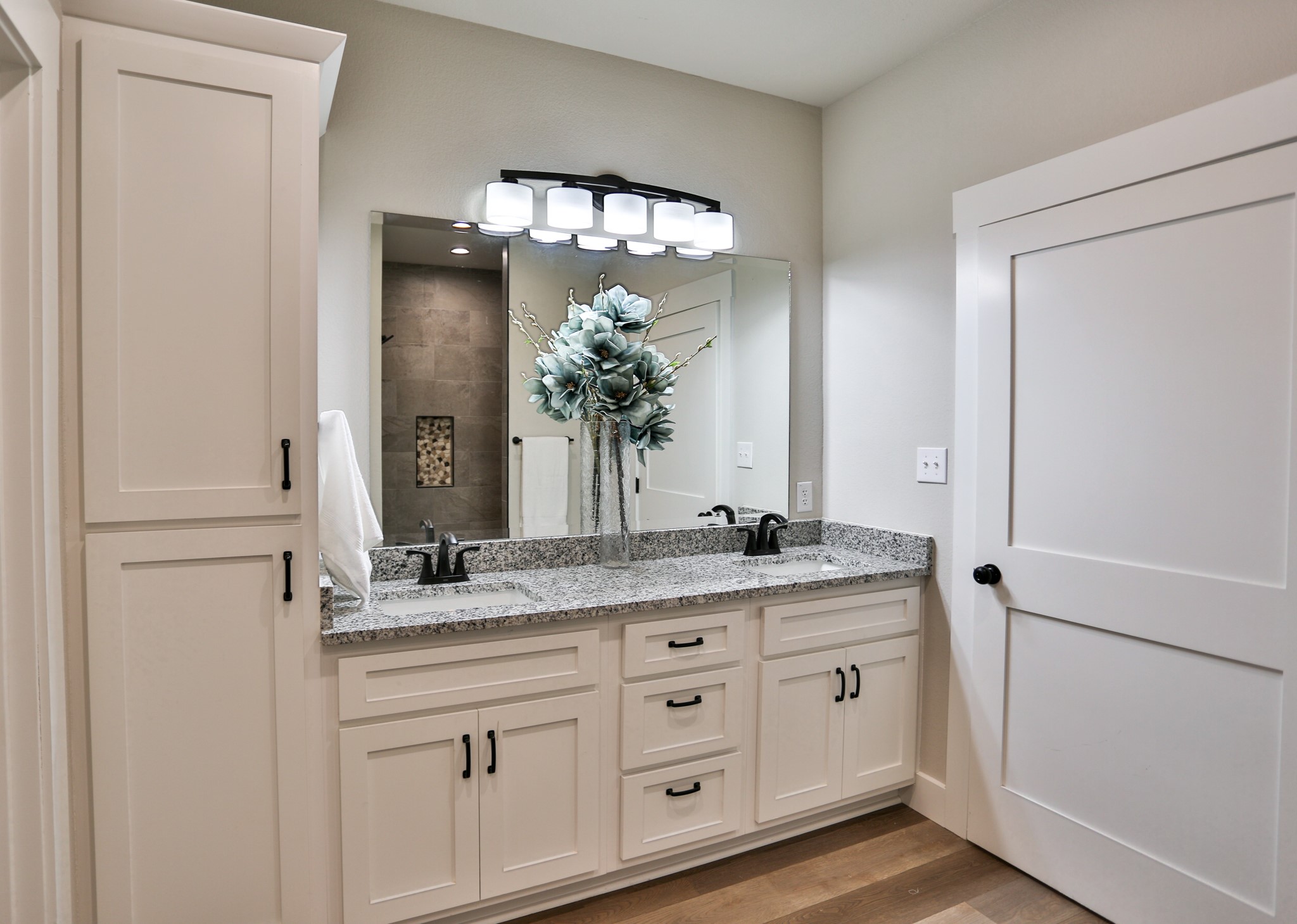 325 String Prairie Way Smithville, TX 78957 - Photo 13 of 23 a bathroom with a granite countertop sink and a mirror