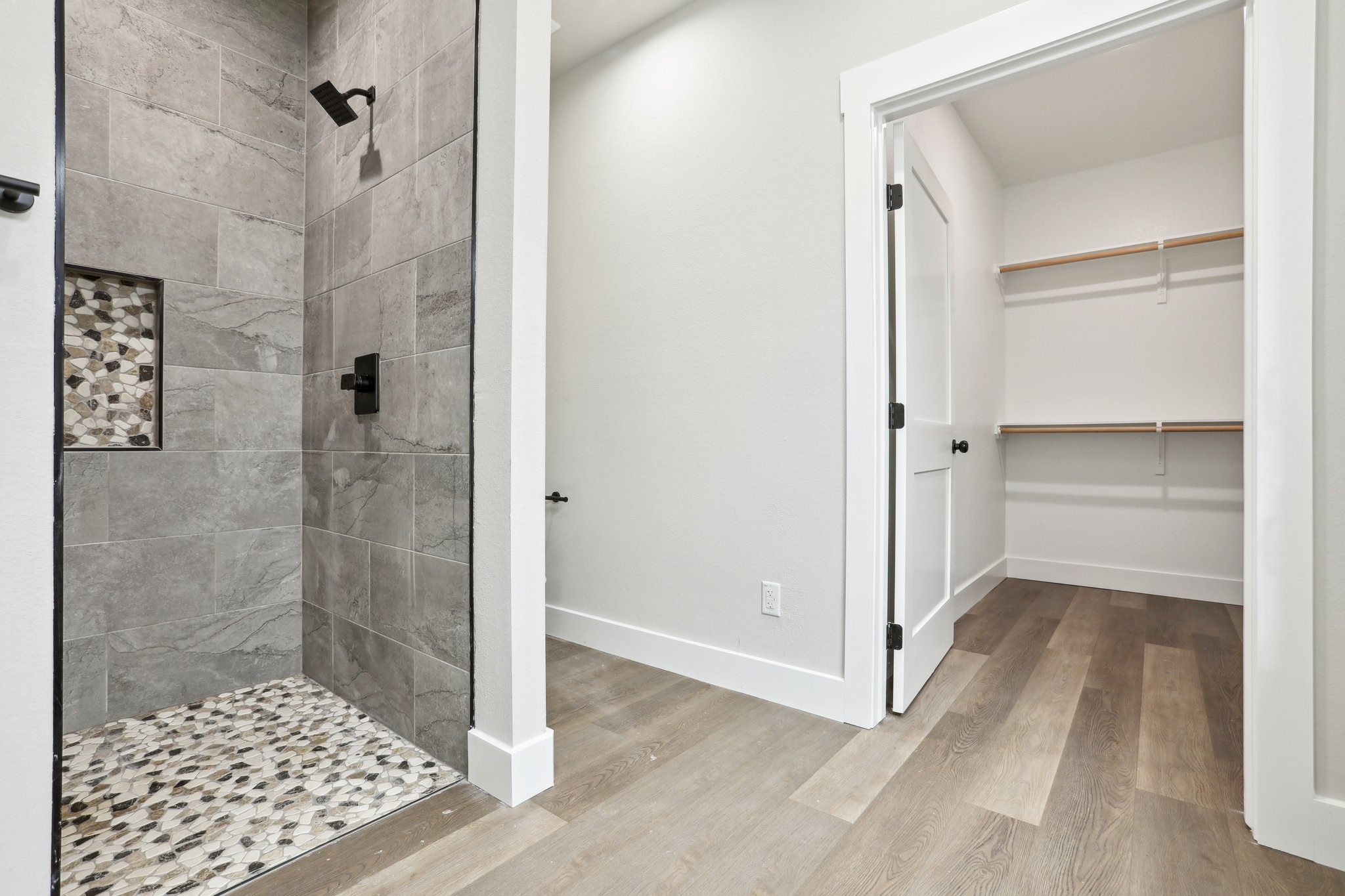 325 String Prairie Way Smithville, TX 78957 - Photo 16 of 23 a bathroom with a glass shower door