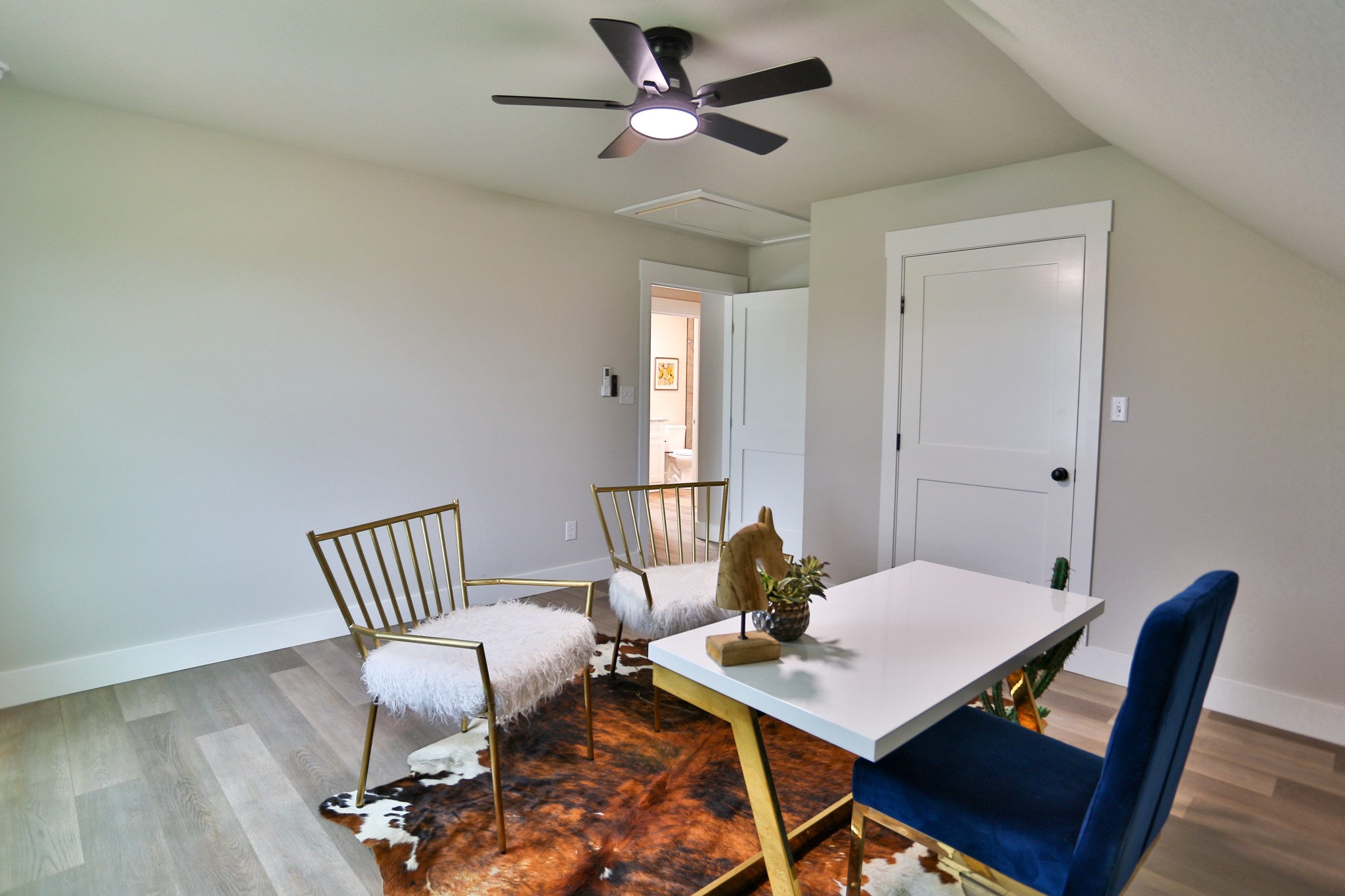 325 String Prairie Way Smithville, TX 78957 - Photo 17 of 23 a view of a dining room with furniture and a chandelier