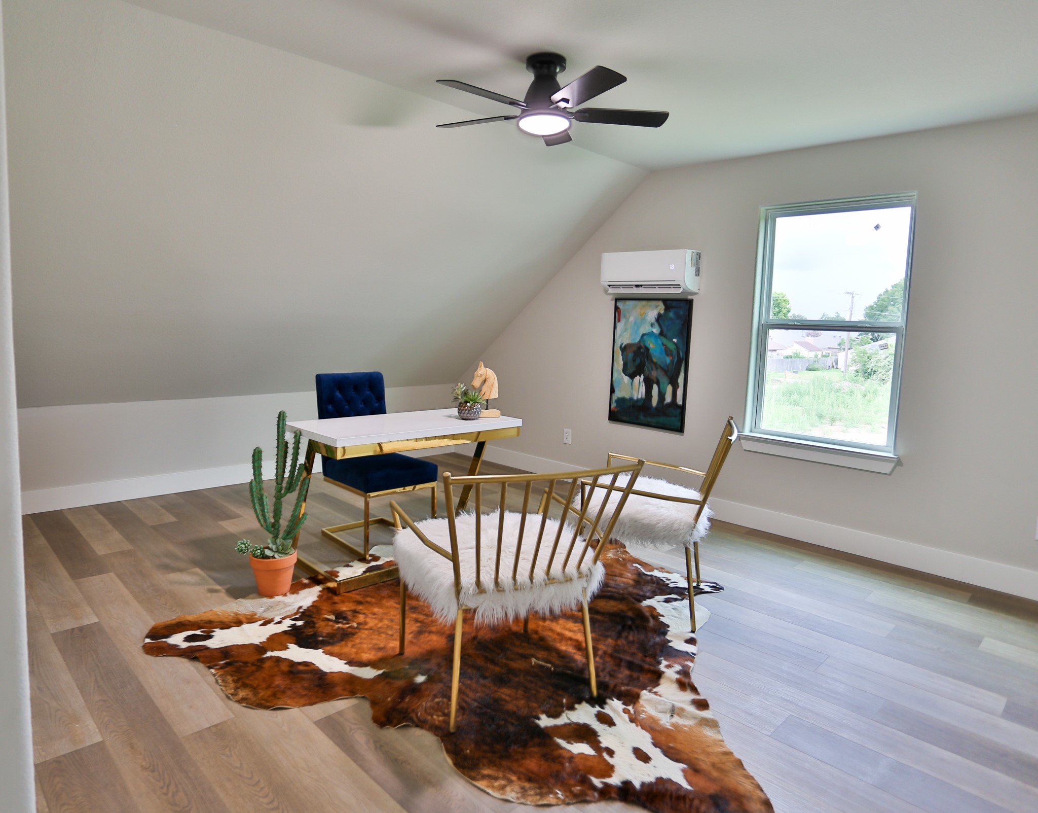 325 String Prairie Way Smithville, TX 78957 - Photo 18 of 23 a view of a dining room with furniture window and wooden floor