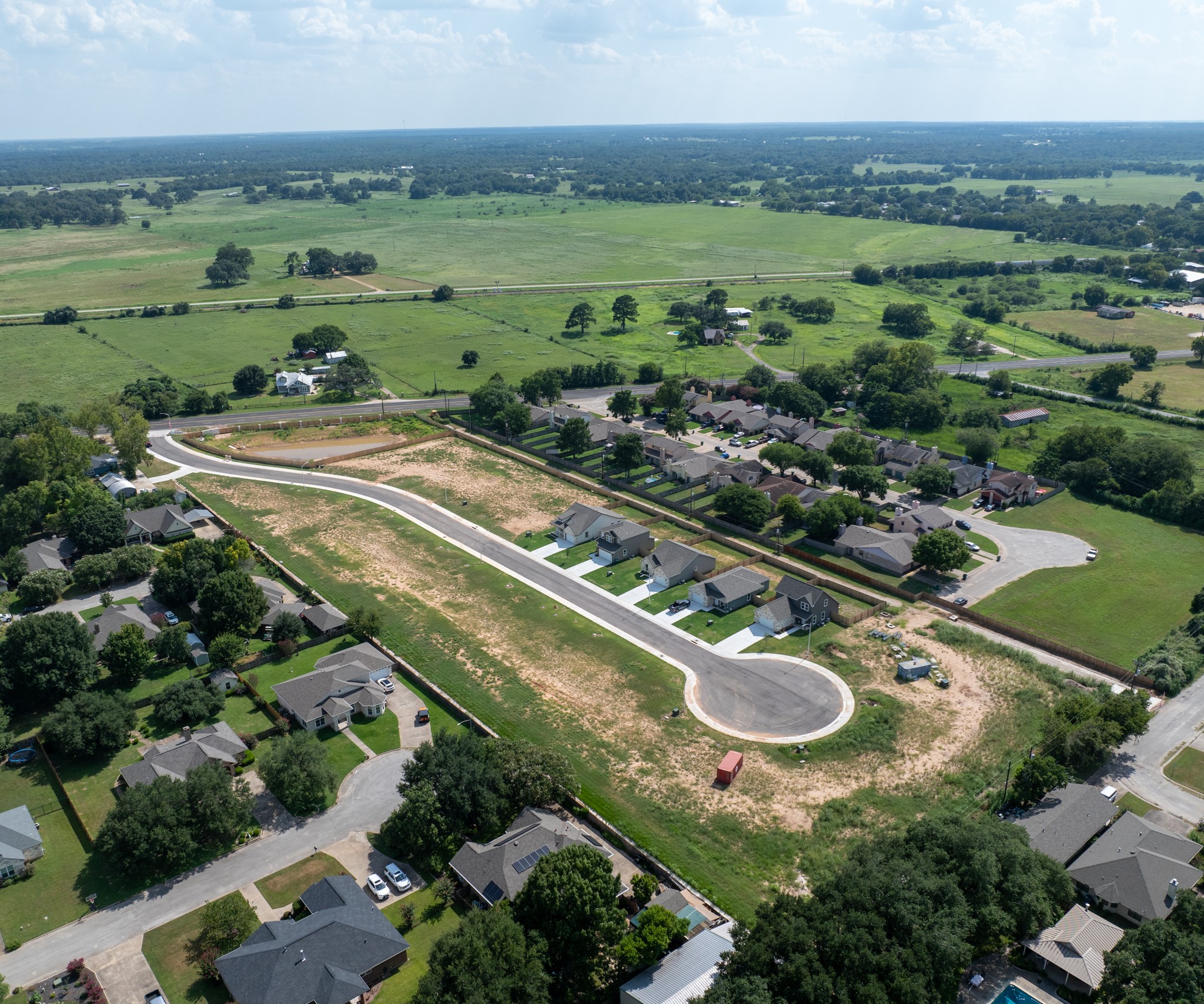 325 String Prairie Way Smithville, TX 78957 - Photo 23 of 23 an aerial view of a city
