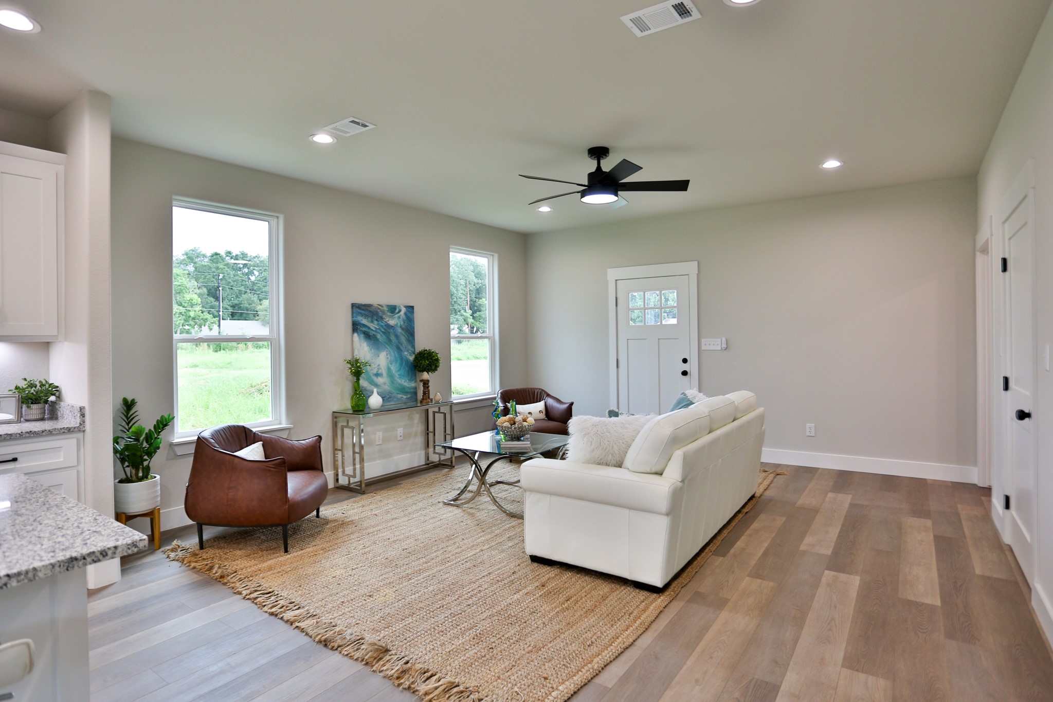 325 String Prairie Way Smithville, TX 78957 - Photo 8 of 23 a living room with furniture and a large window
