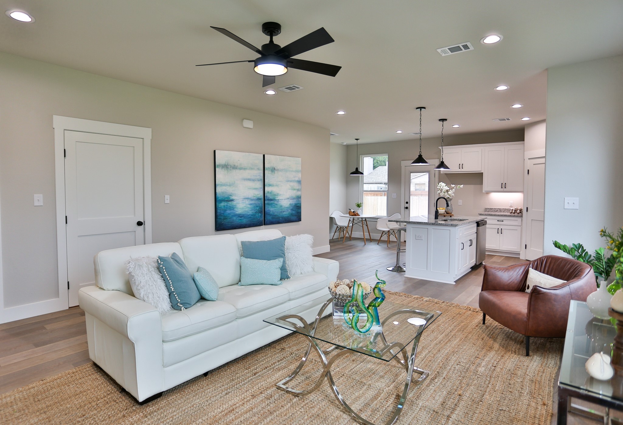 325 String Prairie Way Smithville, TX 78957 - Photo 9 of 23 a living room with furniture and a view of kitchen