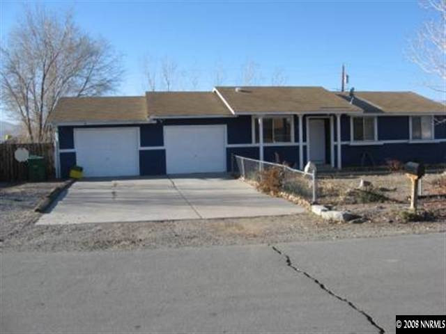 3390 Becard Lane Reno, NV 89508 - Photo 1 of 7 a front view of a house with a yard