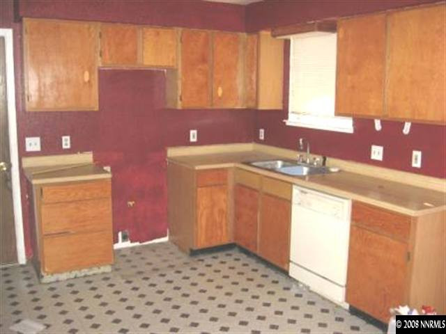 3390 Becard Lane Reno, NV 89508 - Photo 3 of 7 a bathroom with a sink and a vanity