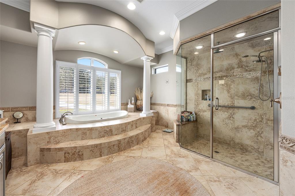 9389 Southwest 14th Avenue Ocala, FL 34476 - Photo 24 of 59 a large spacious bathroom with a large tub and shower