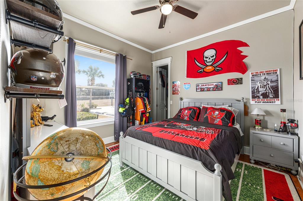 9389 Southwest 14th Avenue Ocala, FL 34476 - Photo 37 of 59 a bedroom with a bed and a dresser