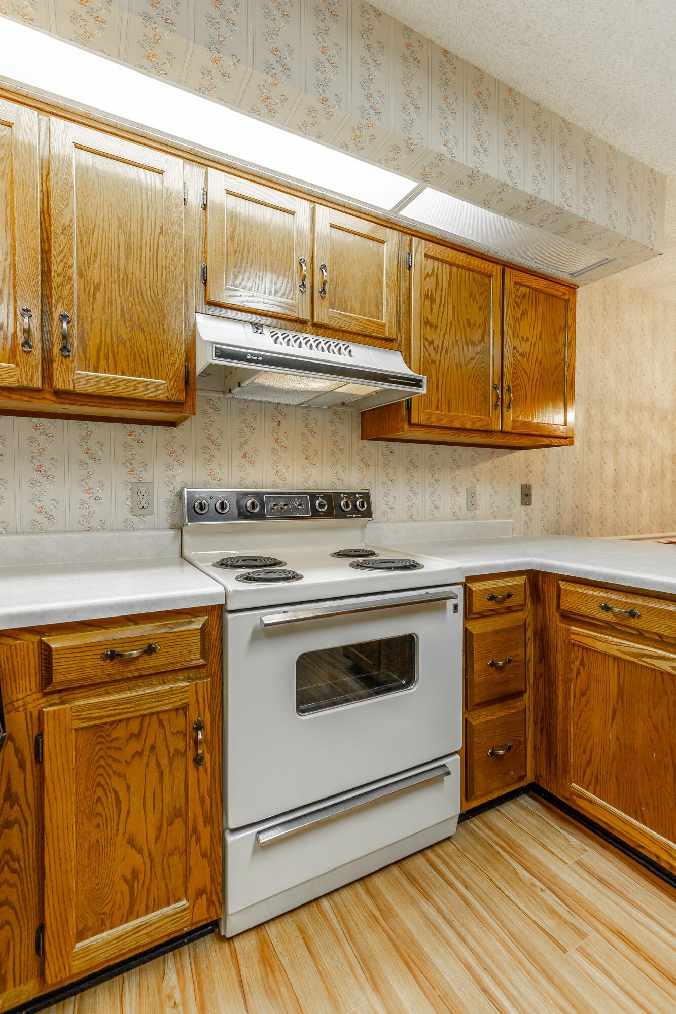 6780 Hickory Creek Road Chattanooga, TN 37421 - Photo 15 of 60 a kitchen with stainless steel appliances granite countertop a stove and white cabinets