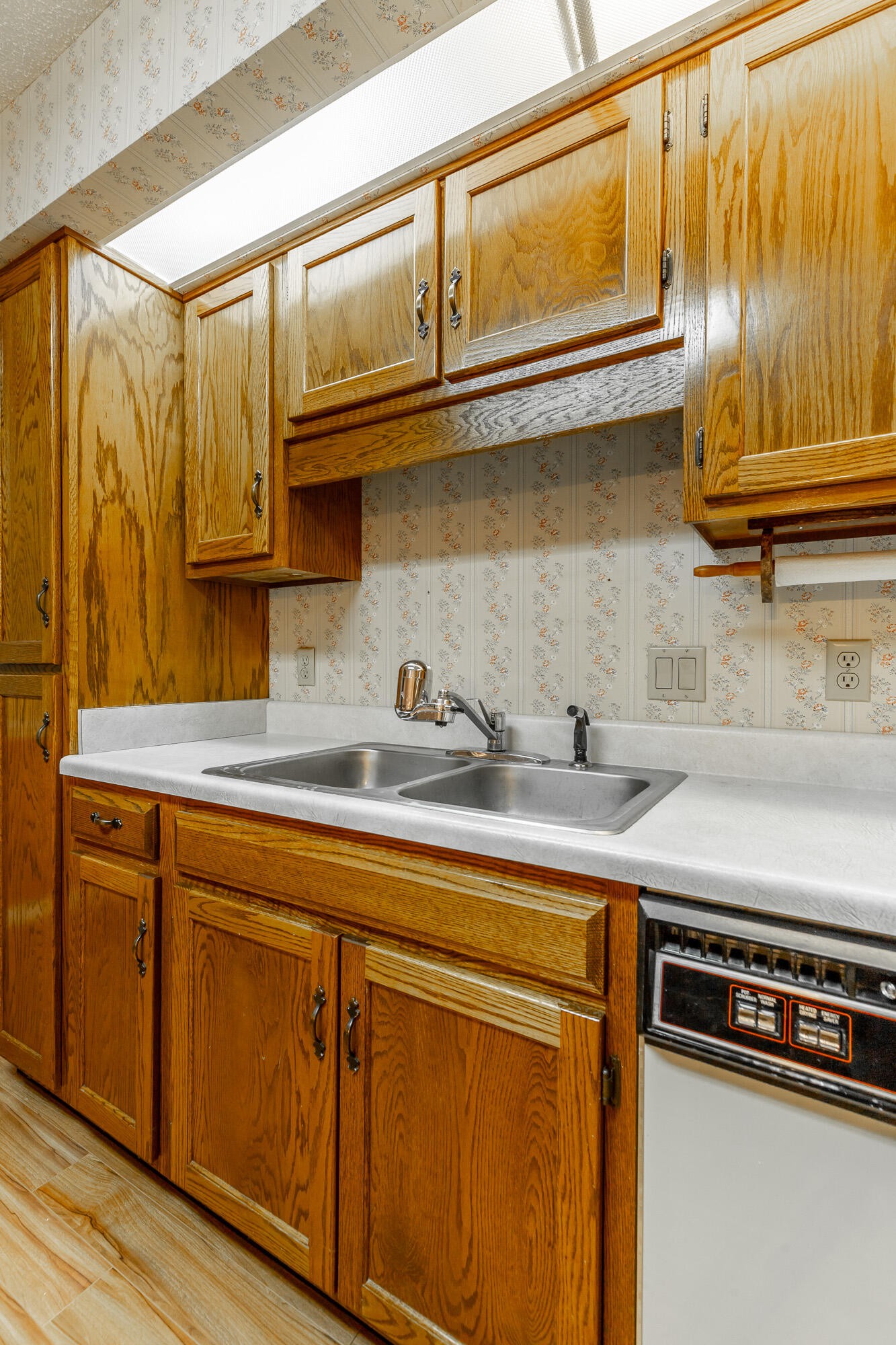 6780 Hickory Creek Road Chattanooga, TN 37421 - Photo 16 of 60 a kitchen with stainless steel appliances granite countertop a sink and cabinets with wooden floor