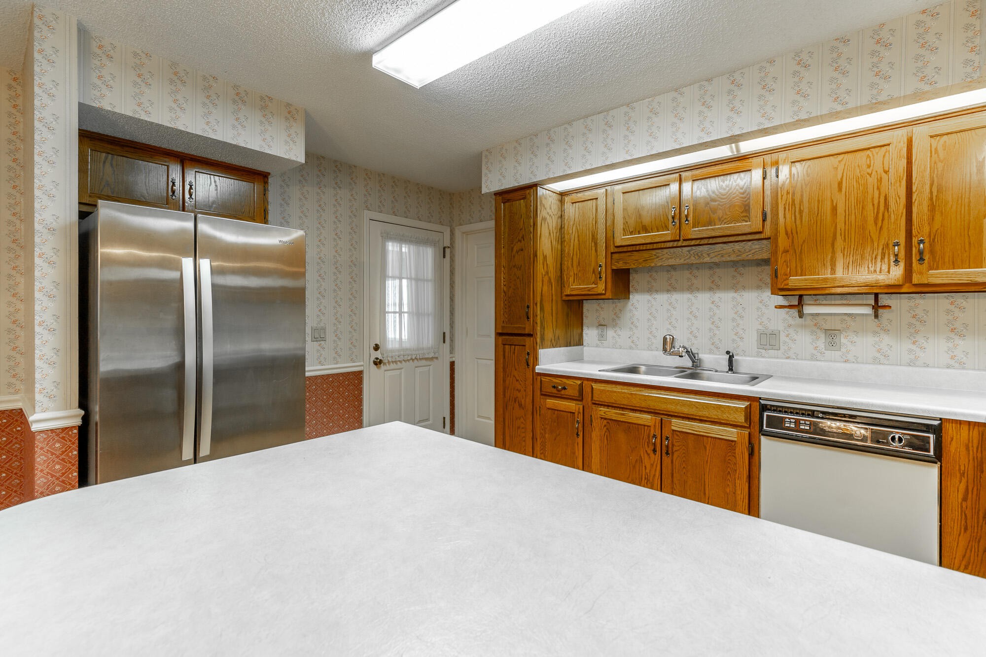 6780 Hickory Creek Road Chattanooga, TN 37421 - Photo 17 of 60 a kitchen with granite countertop a sink stainless steel appliances and cabinets