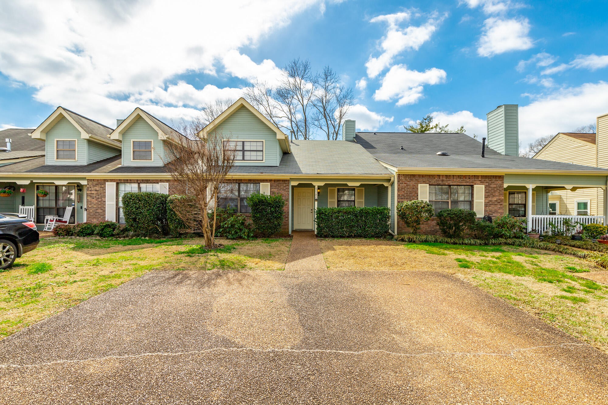 6780 Hickory Creek Road Chattanooga, TN 37421 - Photo 3 of 60 a front view of a house with a yard