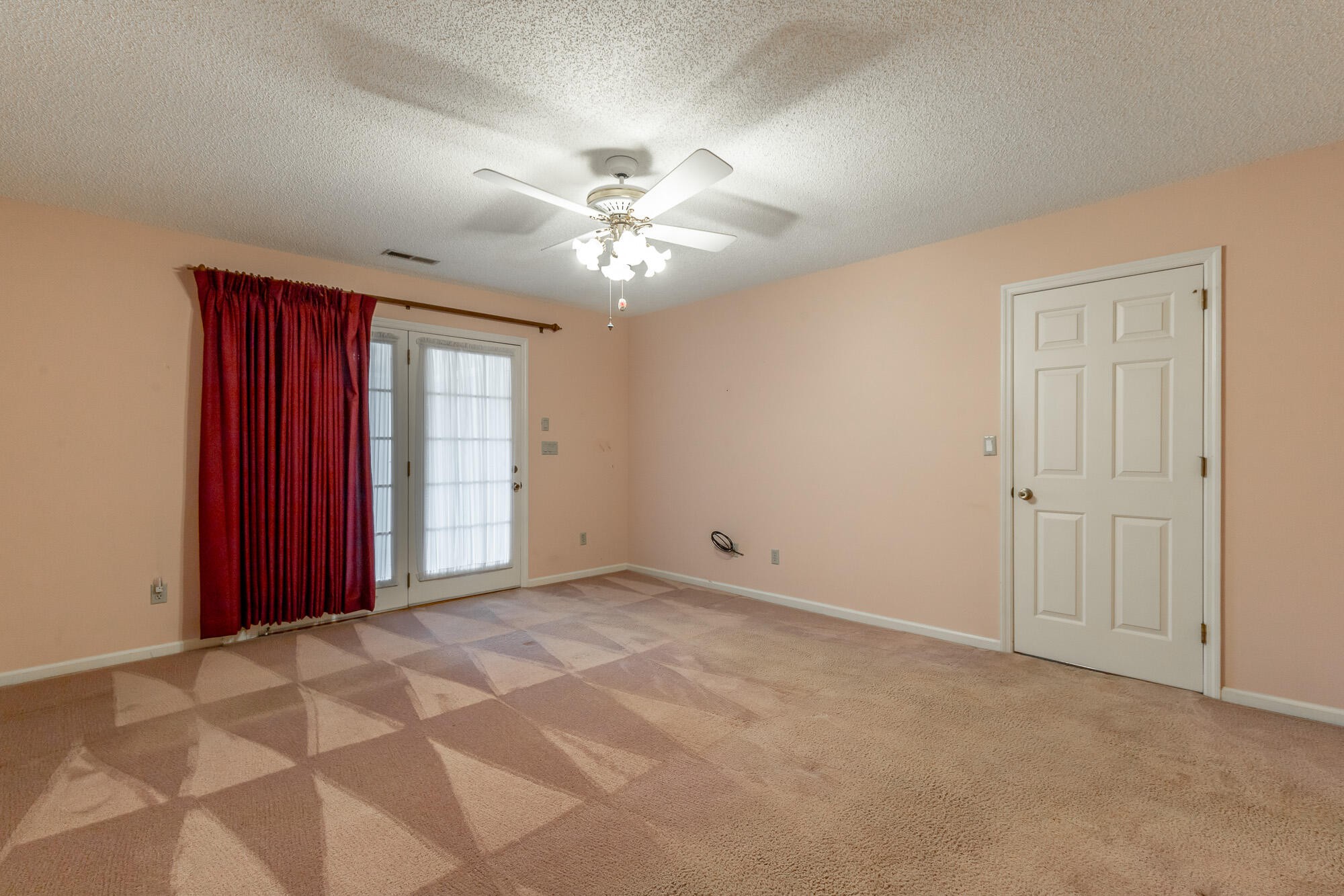 6780 Hickory Creek Road Chattanooga, TN 37421 - Photo 31 of 60 a view of a livingroom with a chandelier fan and windows