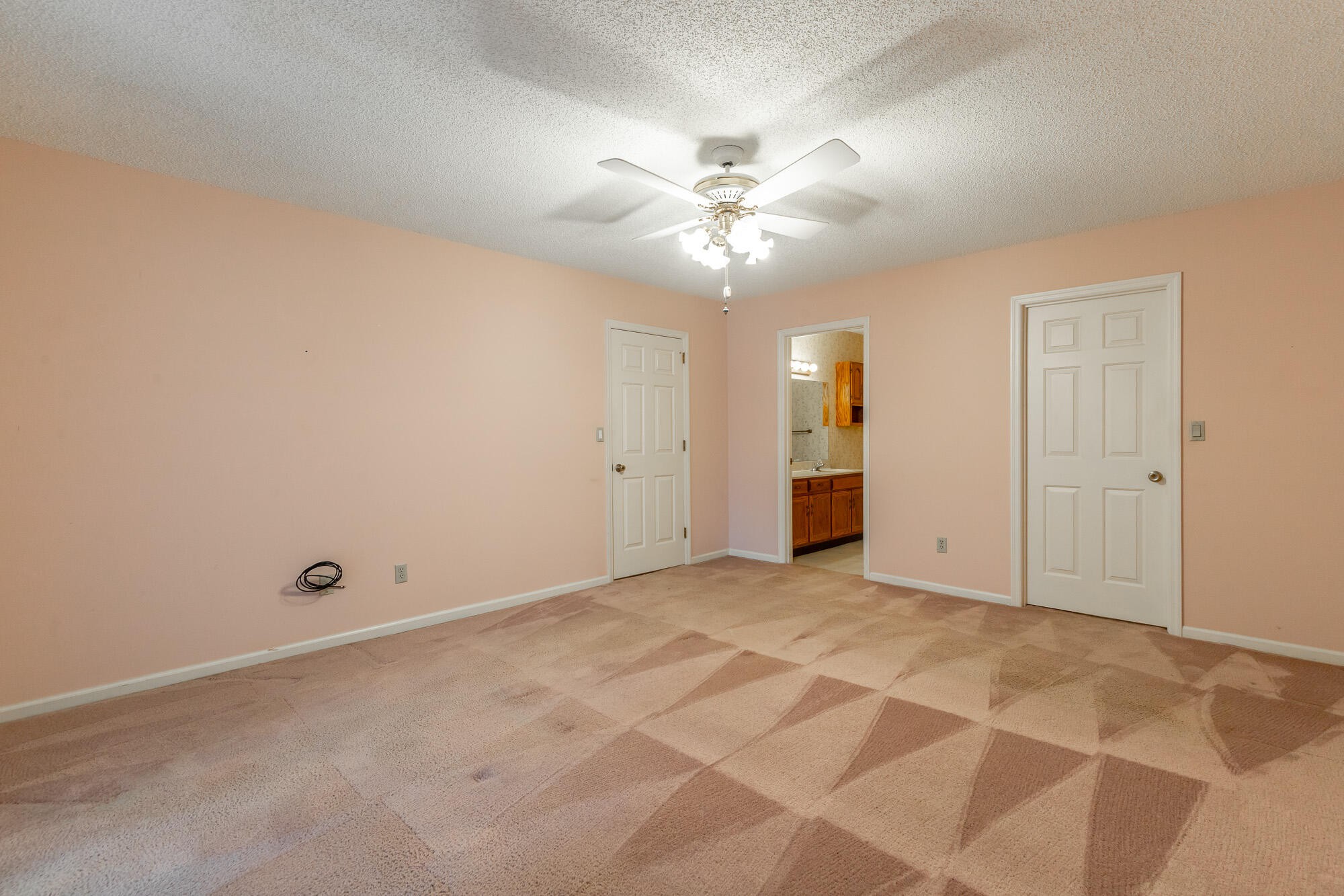 6780 Hickory Creek Road Chattanooga, TN 37421 - Photo 32 of 60 a view of an empty room with a fan