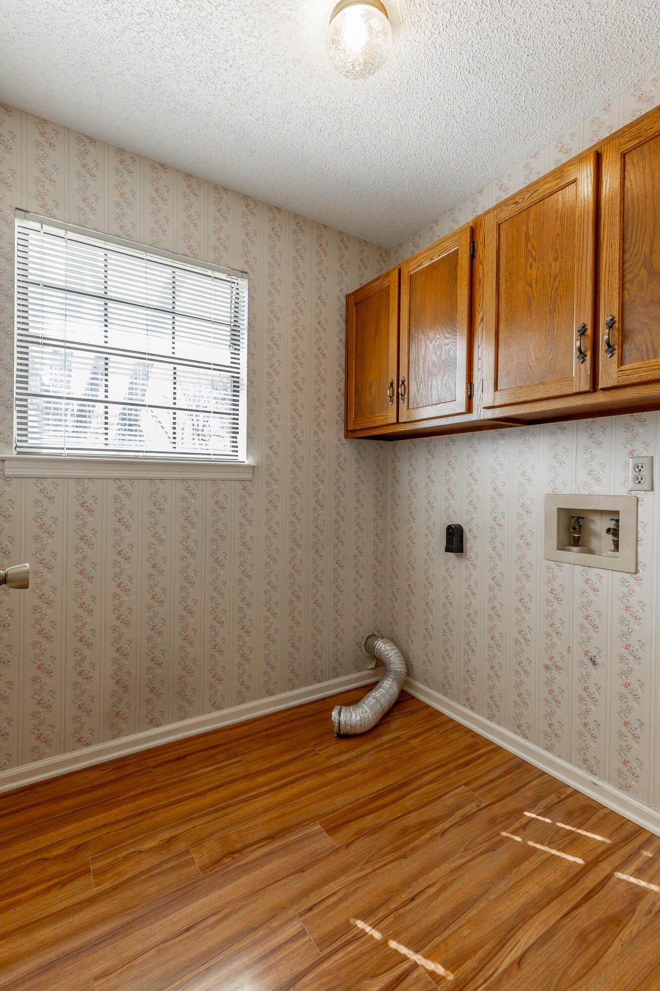 6780 Hickory Creek Road Chattanooga, TN 37421 - Photo 39 of 60 a view of a room with wooden floor and cabinet