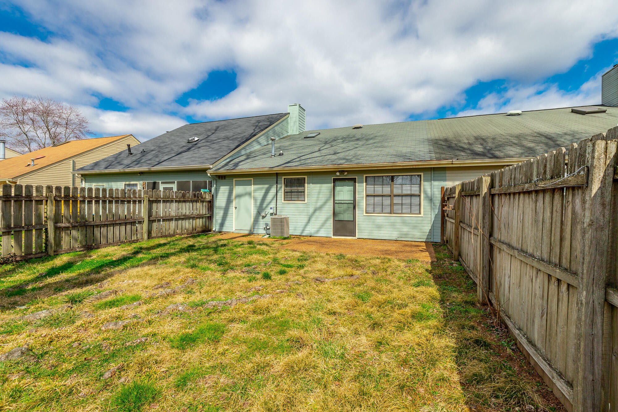 6780 Hickory Creek Road Chattanooga, TN 37421 - Photo 56 of 60 a view of a white house in front of a yard with plants